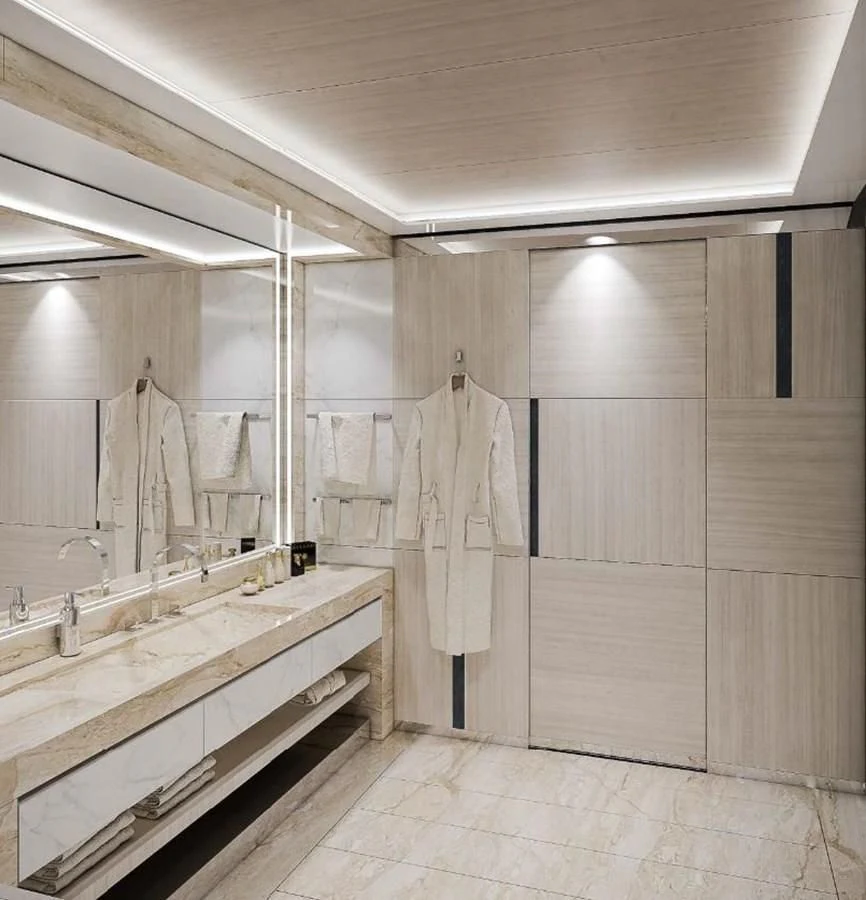 a bathroom with a bathtub and sinks aboard ICE 68 Yacht for Sale