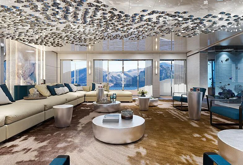 a living room with a large chandelier aboard ICE 68 Yacht for Sale