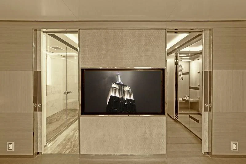 a tv on a wall aboard ICE 68 Yacht for Sale