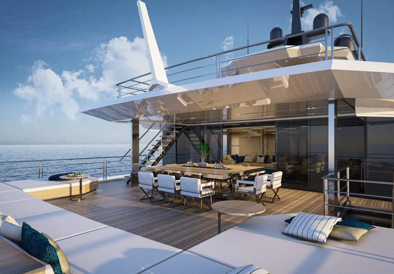 a deck with a large body of water and a deck with chairs and tables and a large boat aboard ICE 68 Yacht for Sale