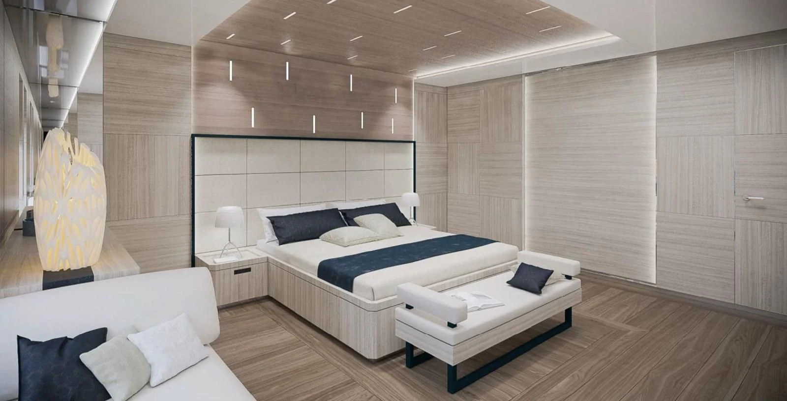 a room with a bed and a couch aboard ICE 68 Yacht for Sale
