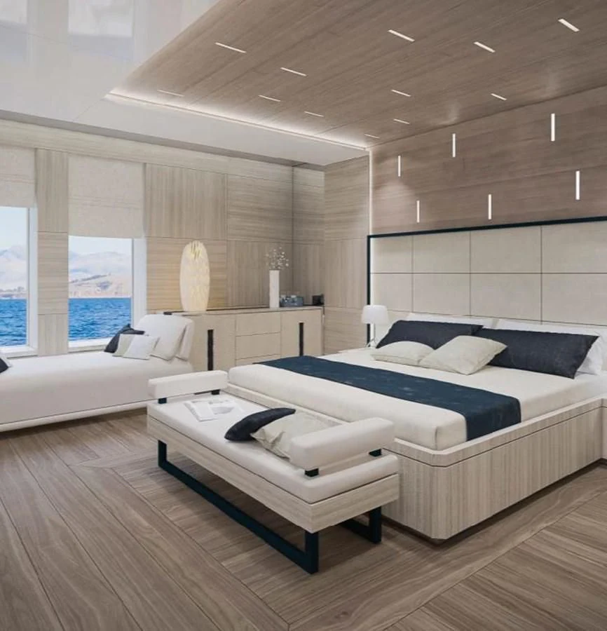 a room with a couple of beds aboard ICE 68 Yacht for Sale