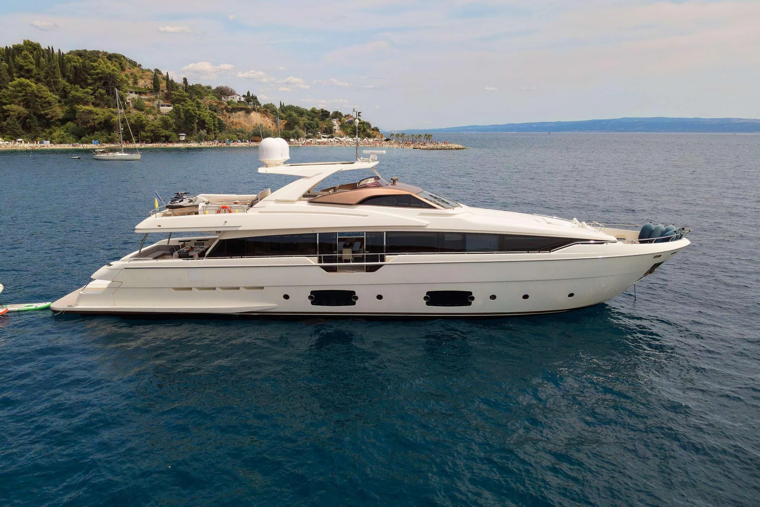 a white yacht in the water aboard IVA Yacht for Sale