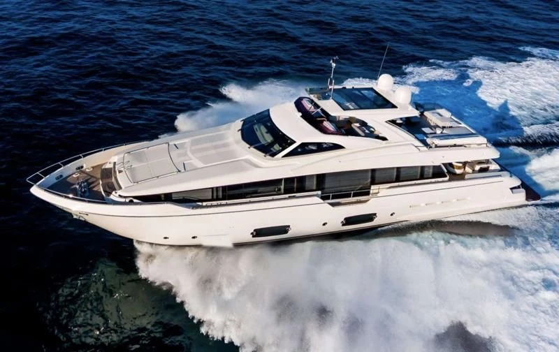 a white yacht on the water aboard IVA Yacht for Sale