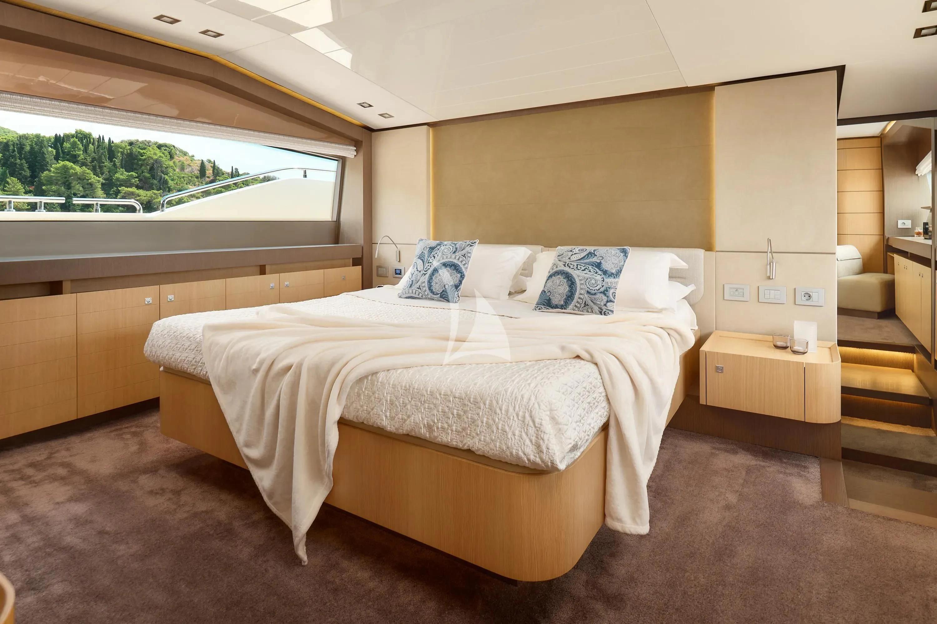 a bed in a room aboard IVA Yacht for Sale