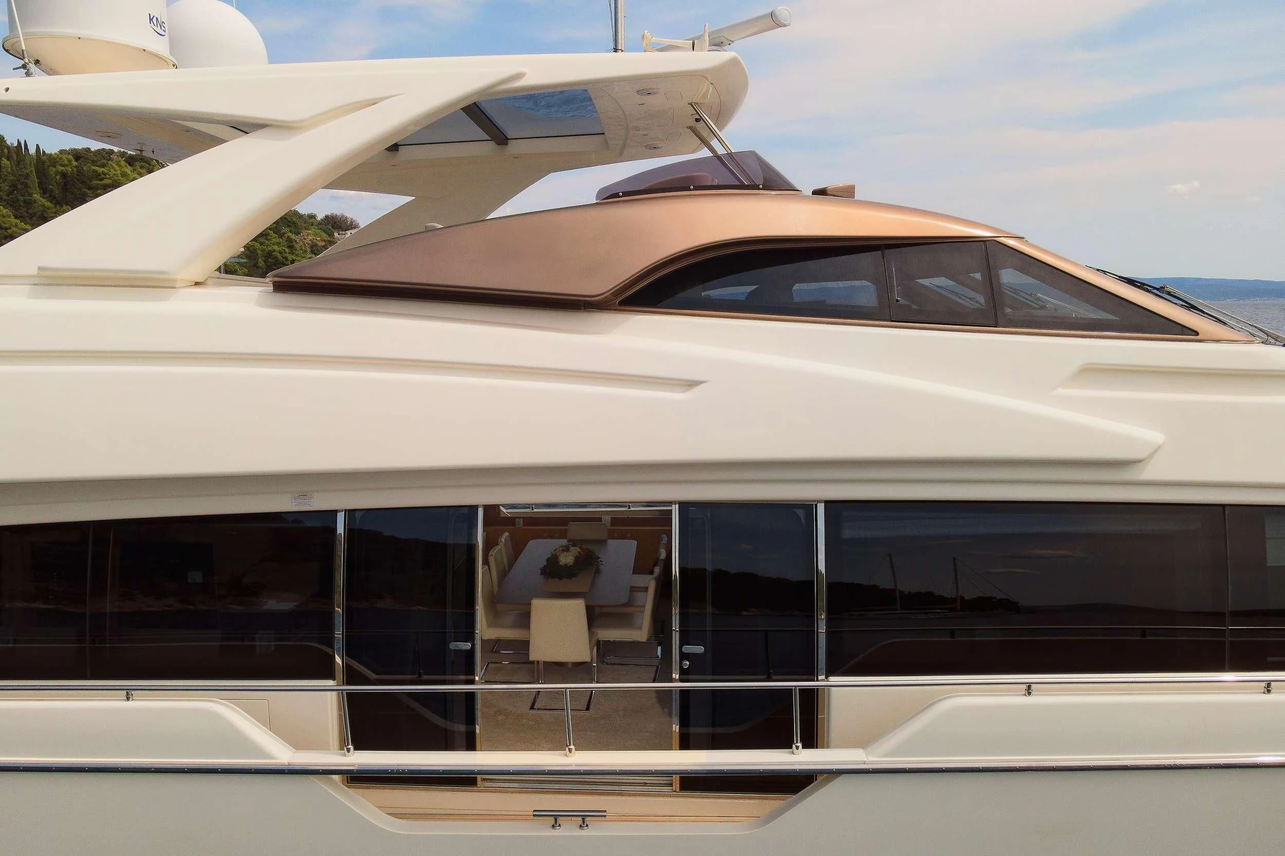 a white train with a door open aboard IVA Yacht for Sale