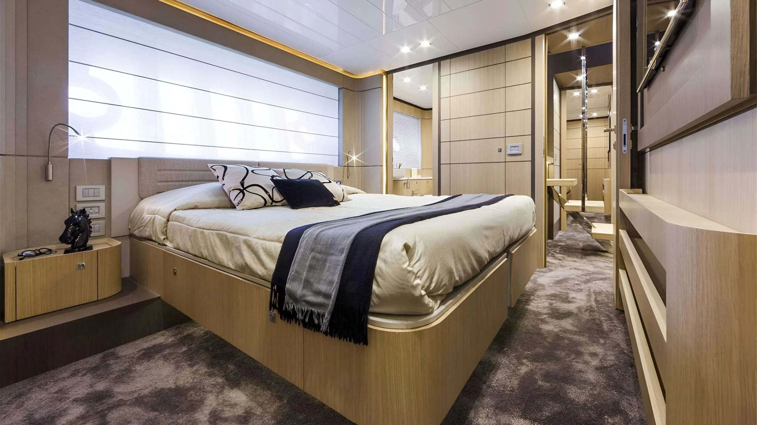 a bed in a room aboard IVA Yacht for Sale