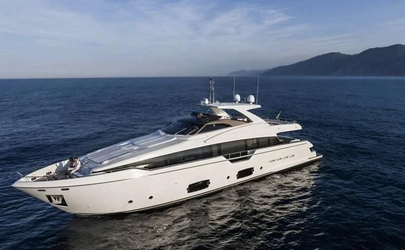 a white yacht on the water aboard IVA Yacht for Sale