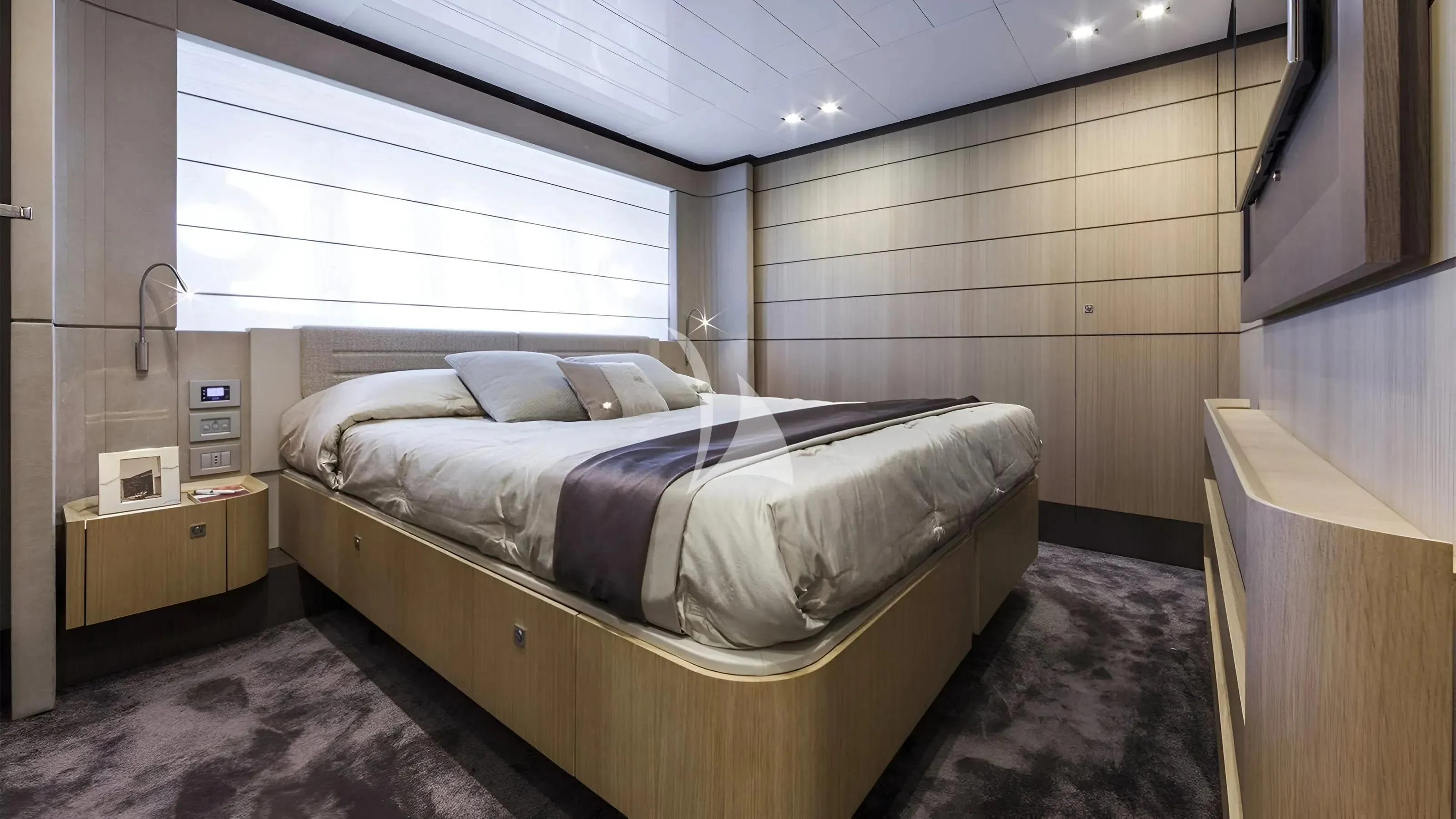a bed in a room aboard IVA Yacht for Sale