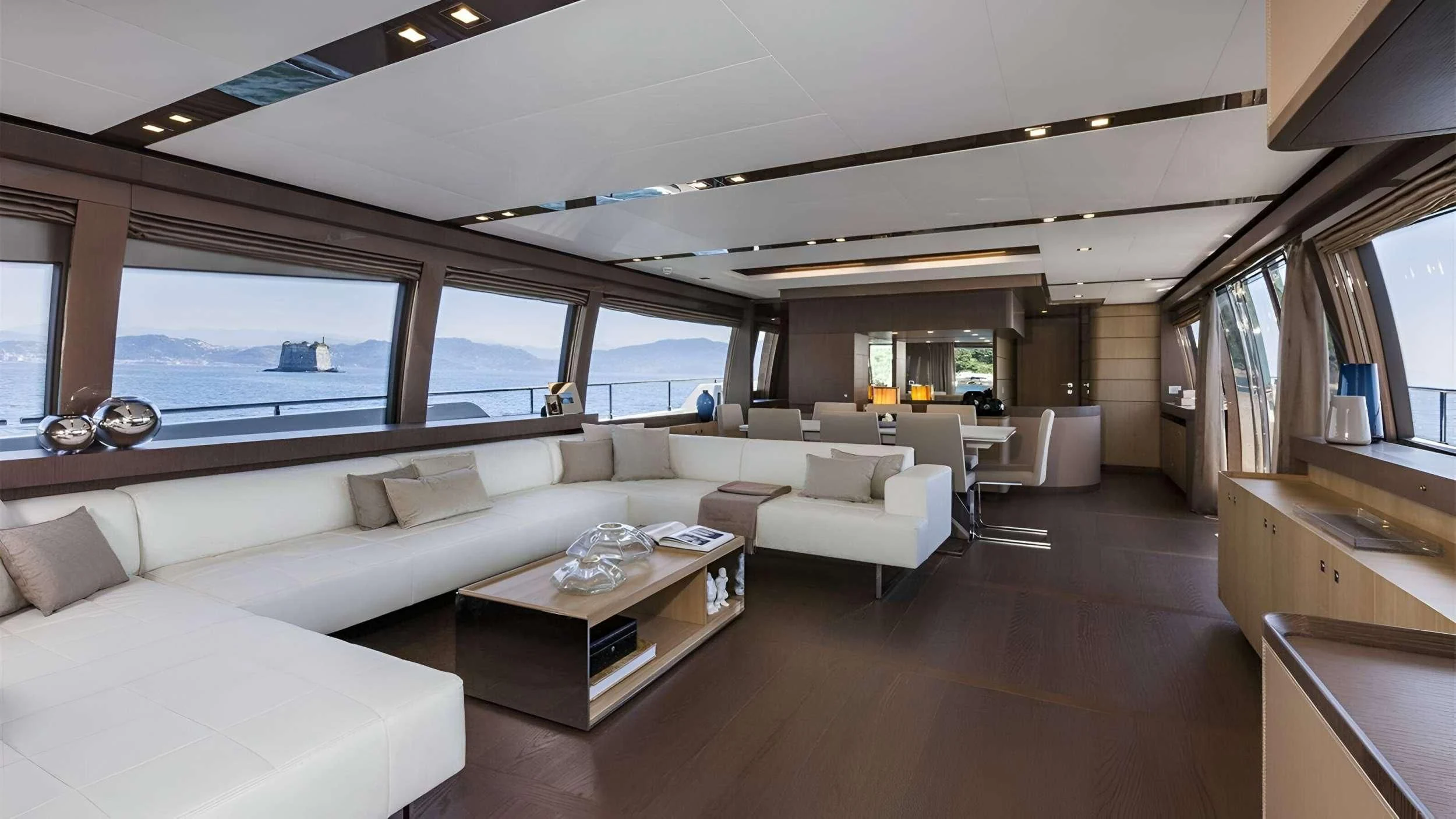 a living room with a large window aboard IVA Yacht for Sale