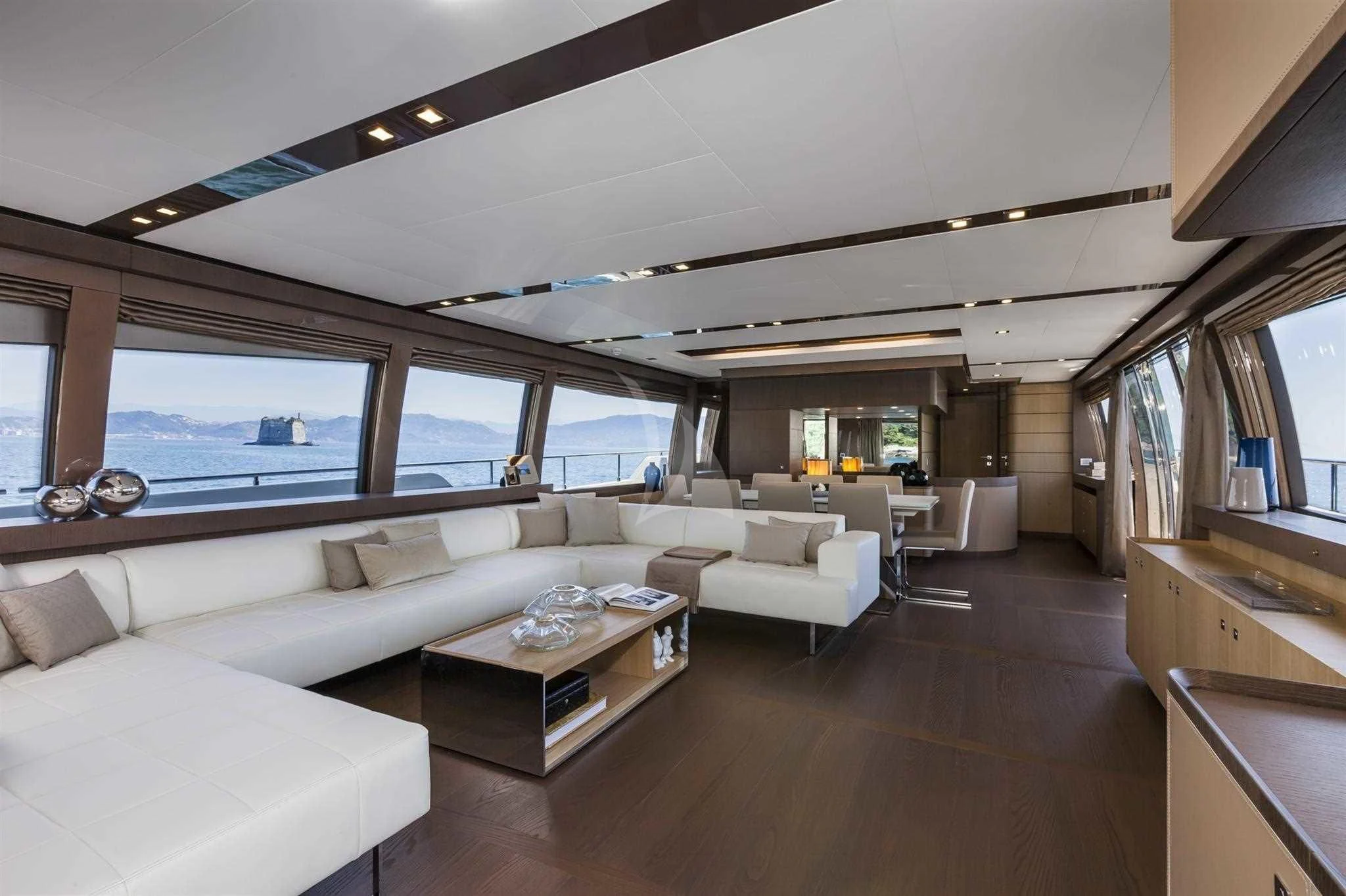 a living room with a large window aboard IVA Yacht for Sale
