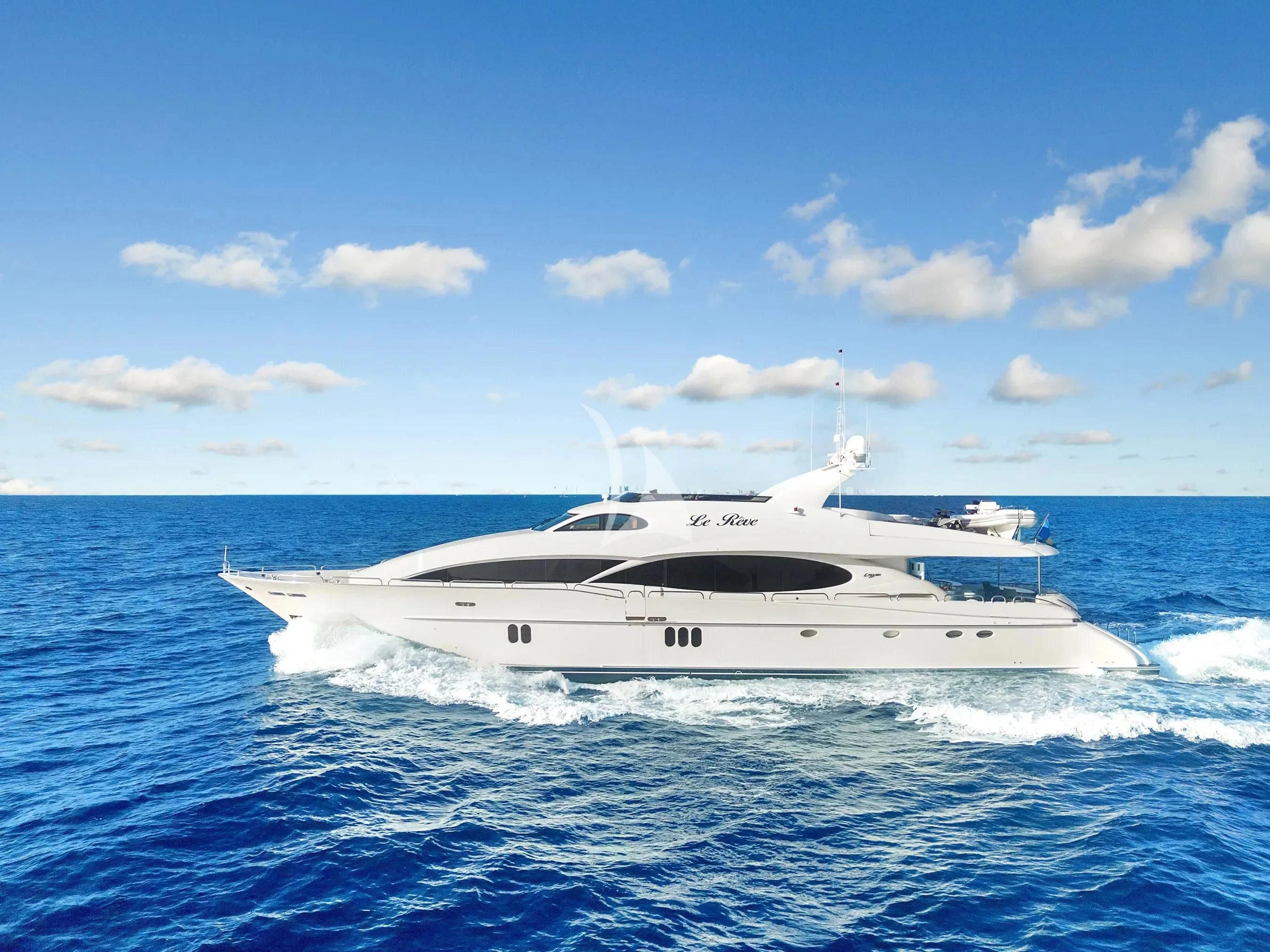 a white yacht in the water aboard LE REVE Yacht for Sale