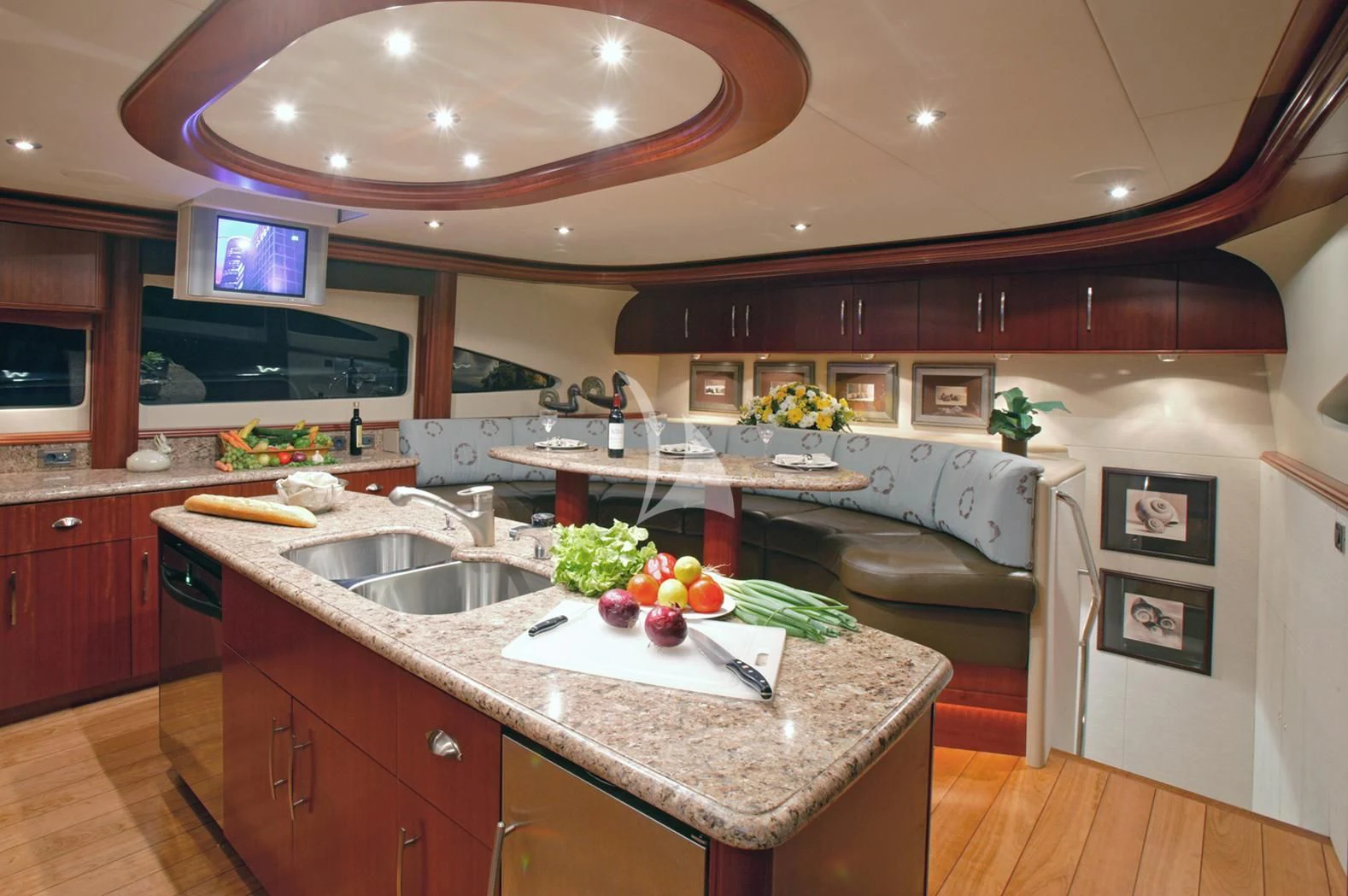 a kitchen with a large island aboard LE REVE Yacht for Sale