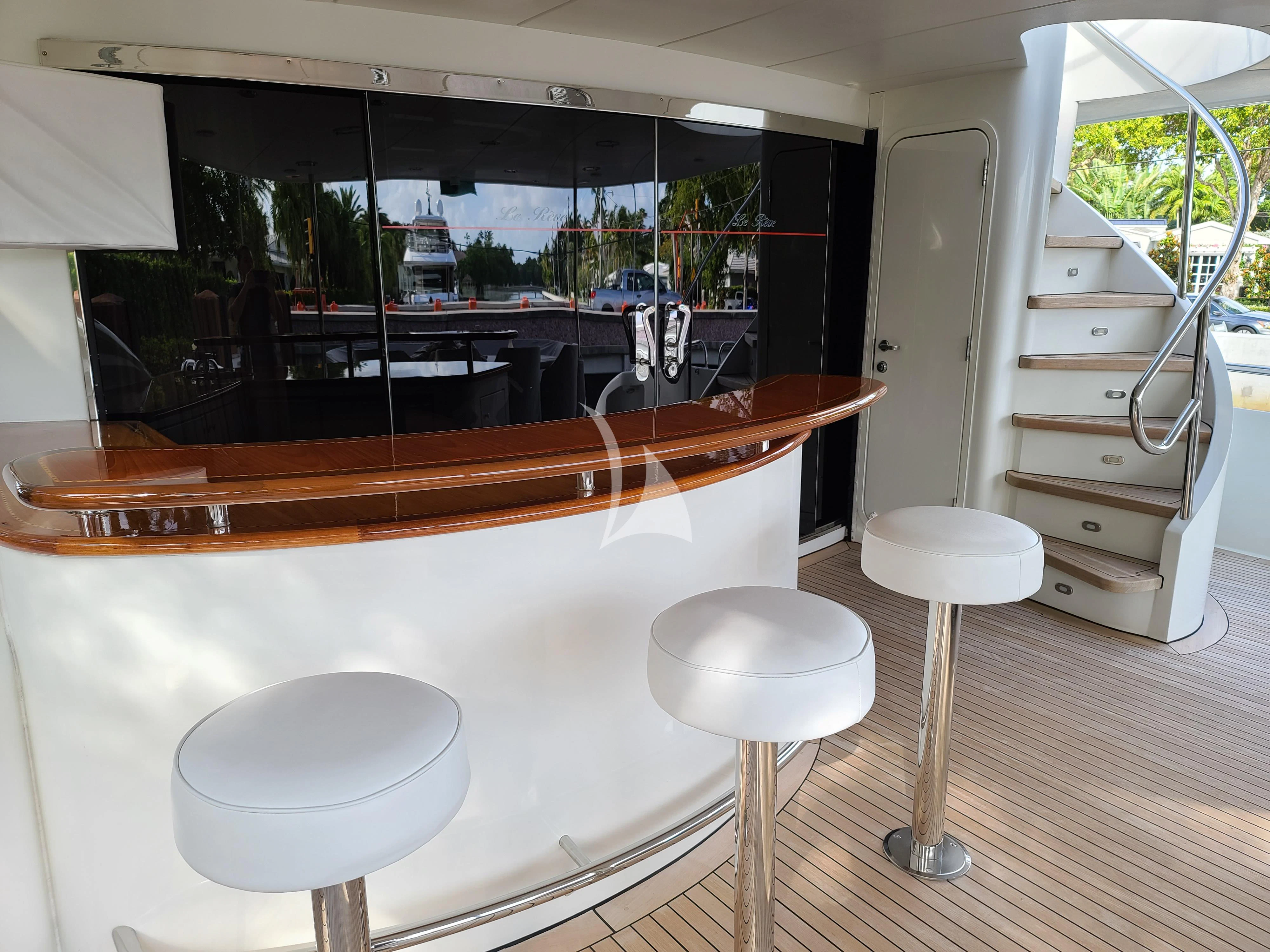 a room with stools and stools aboard LE REVE Yacht for Sale