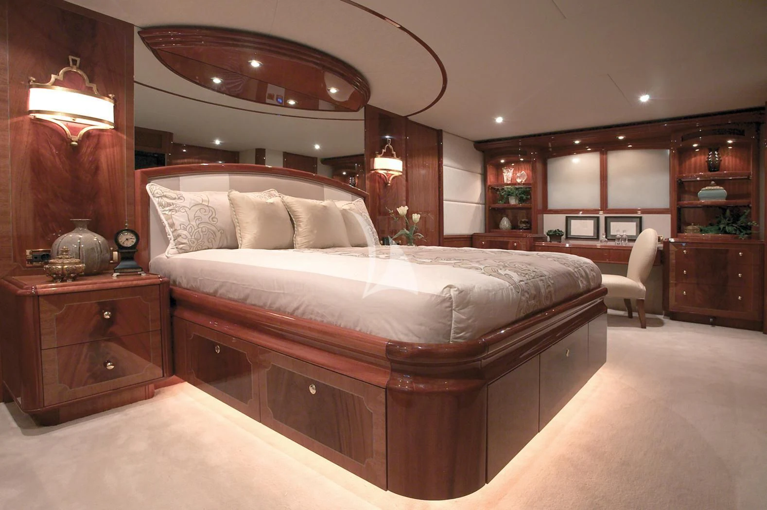a large bed in a room aboard LE REVE Yacht for Sale
