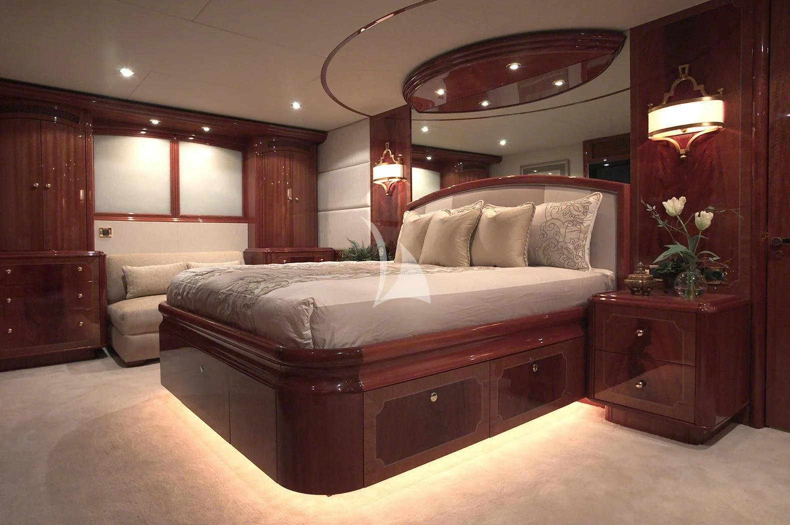 a large bed in a room aboard LE REVE Yacht for Sale