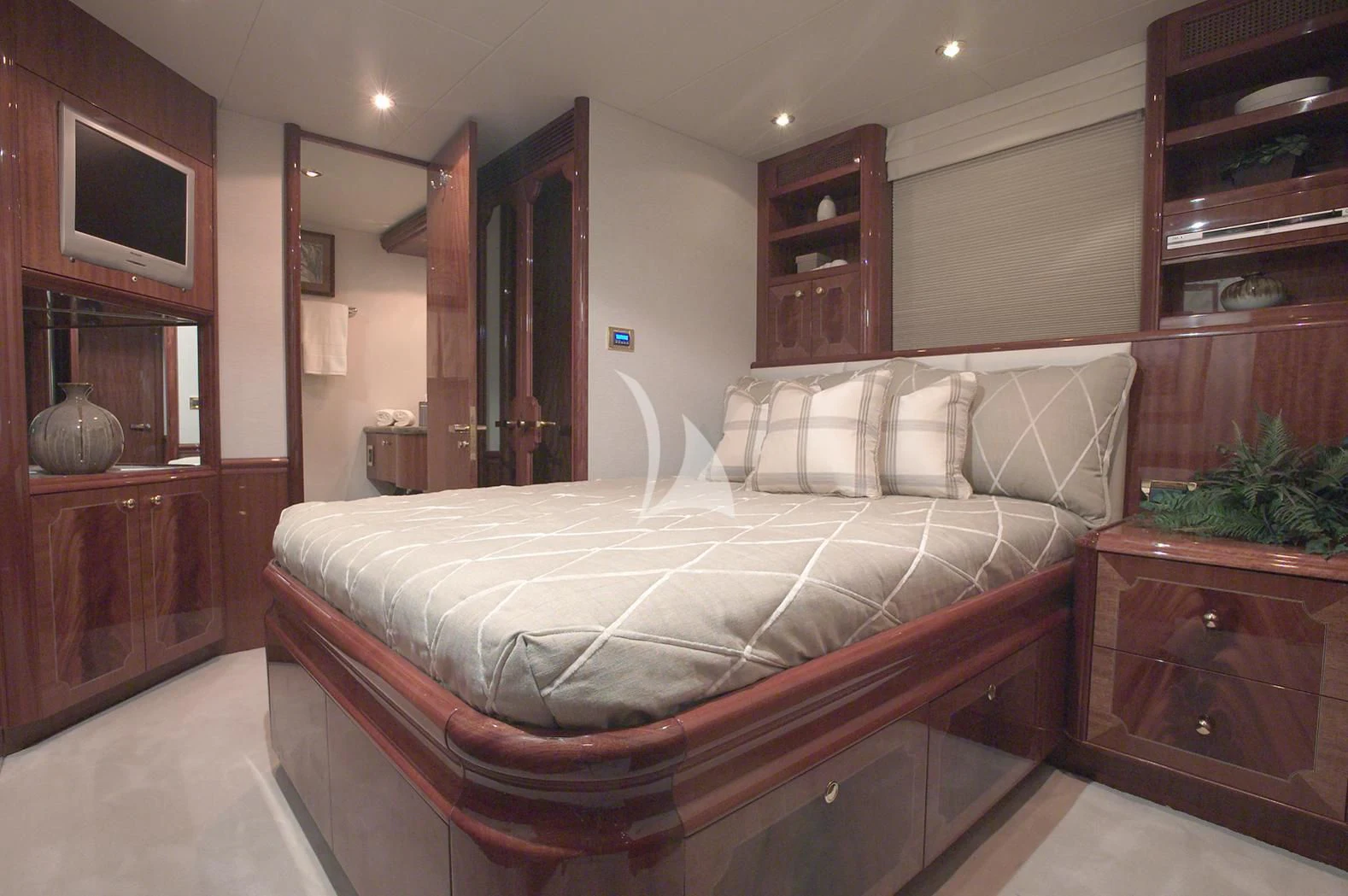 a large bed in a room aboard LE REVE Yacht for Sale