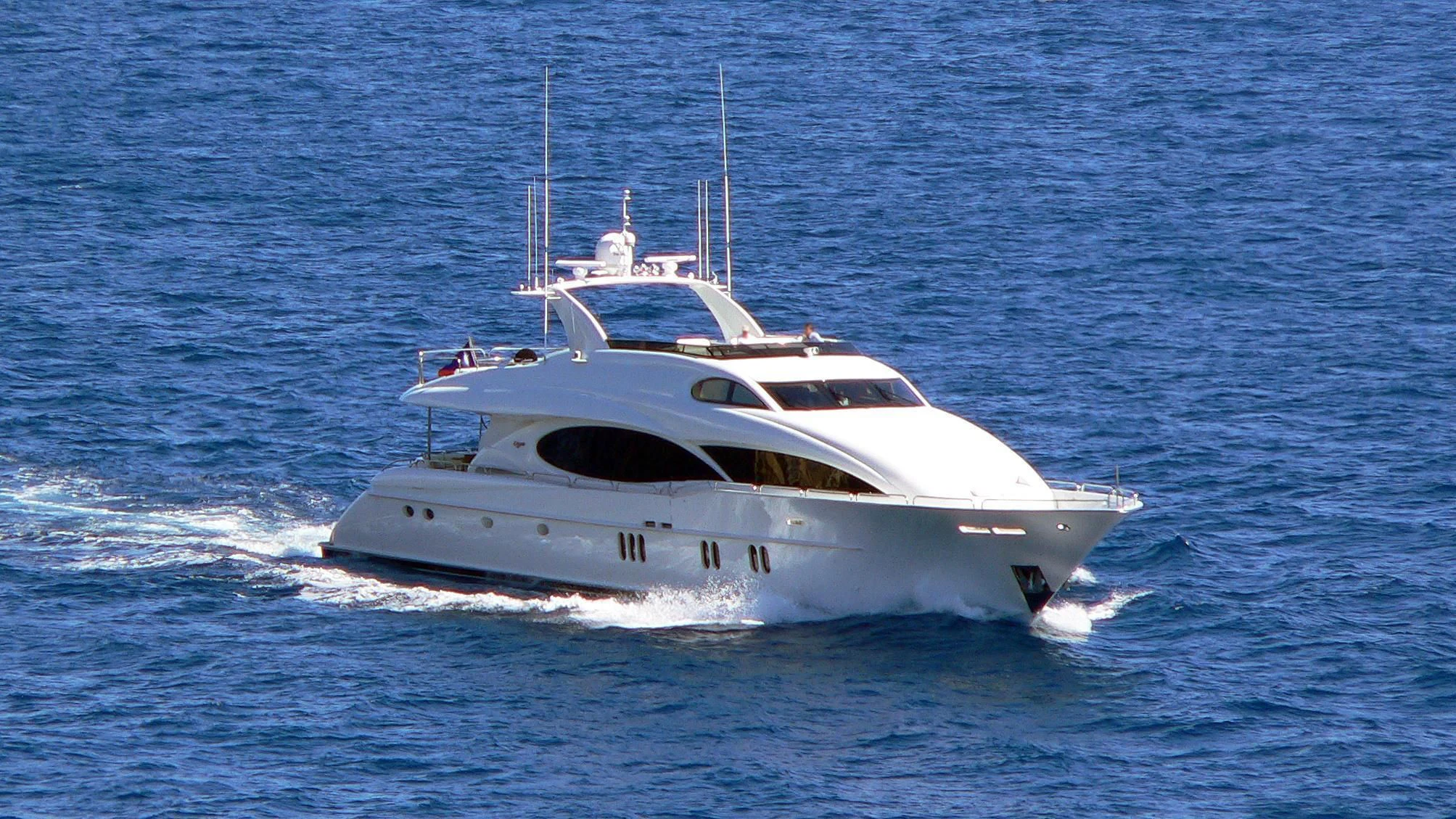 a white yacht in the water aboard LE REVE Yacht for Sale