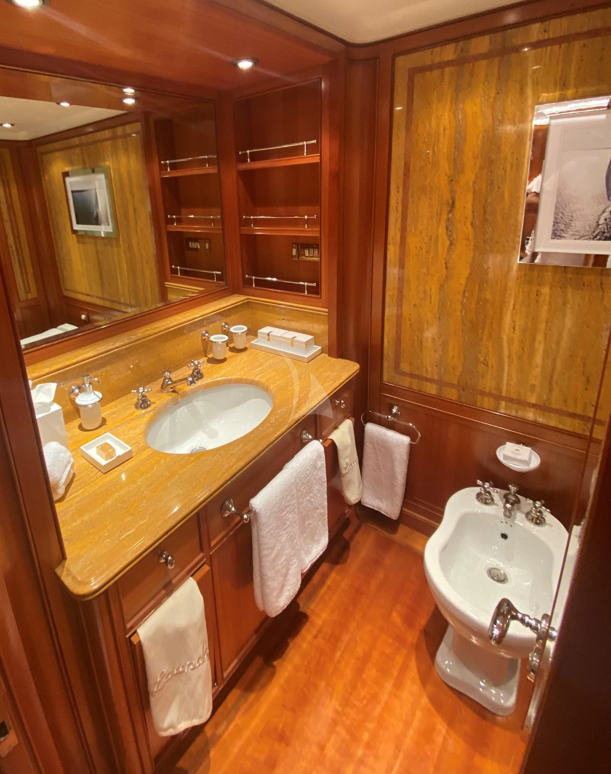 a bathroom with a sink and a mirror aboard ZENJI Yacht for Sale