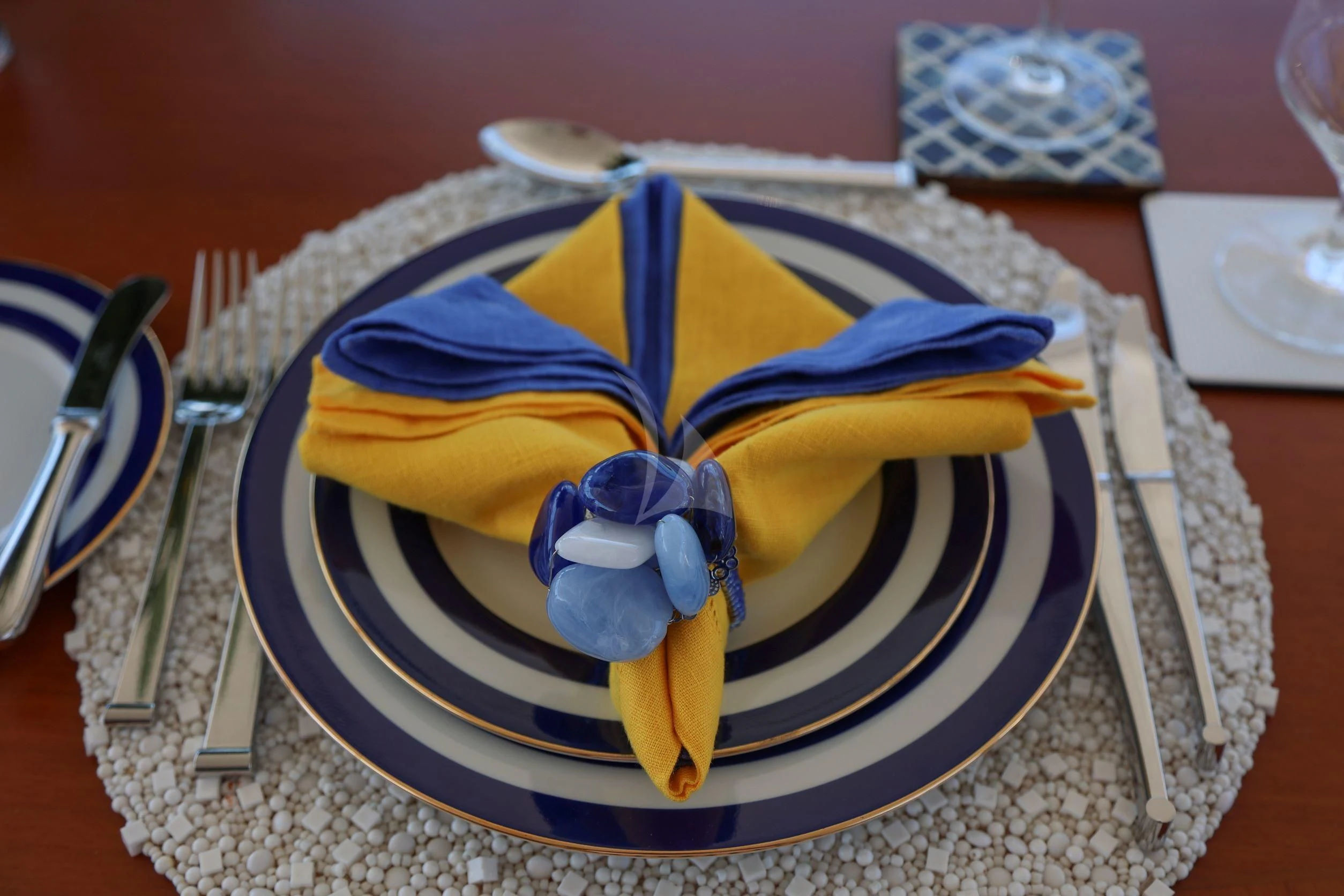 a cake on a plate aboard ZENJI Yacht for Sale