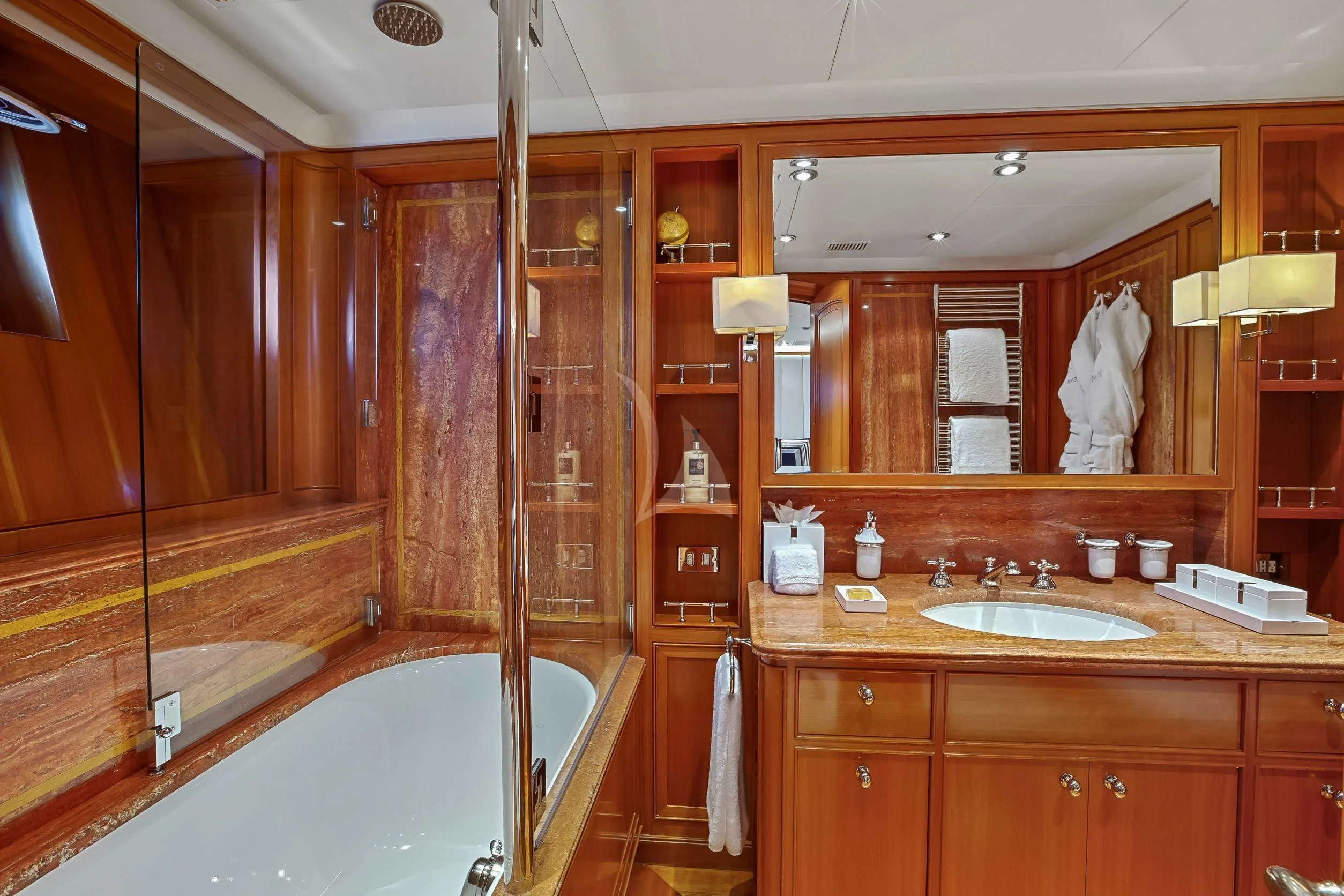 a bathroom with a large mirror aboard ZENJI Yacht for Sale
