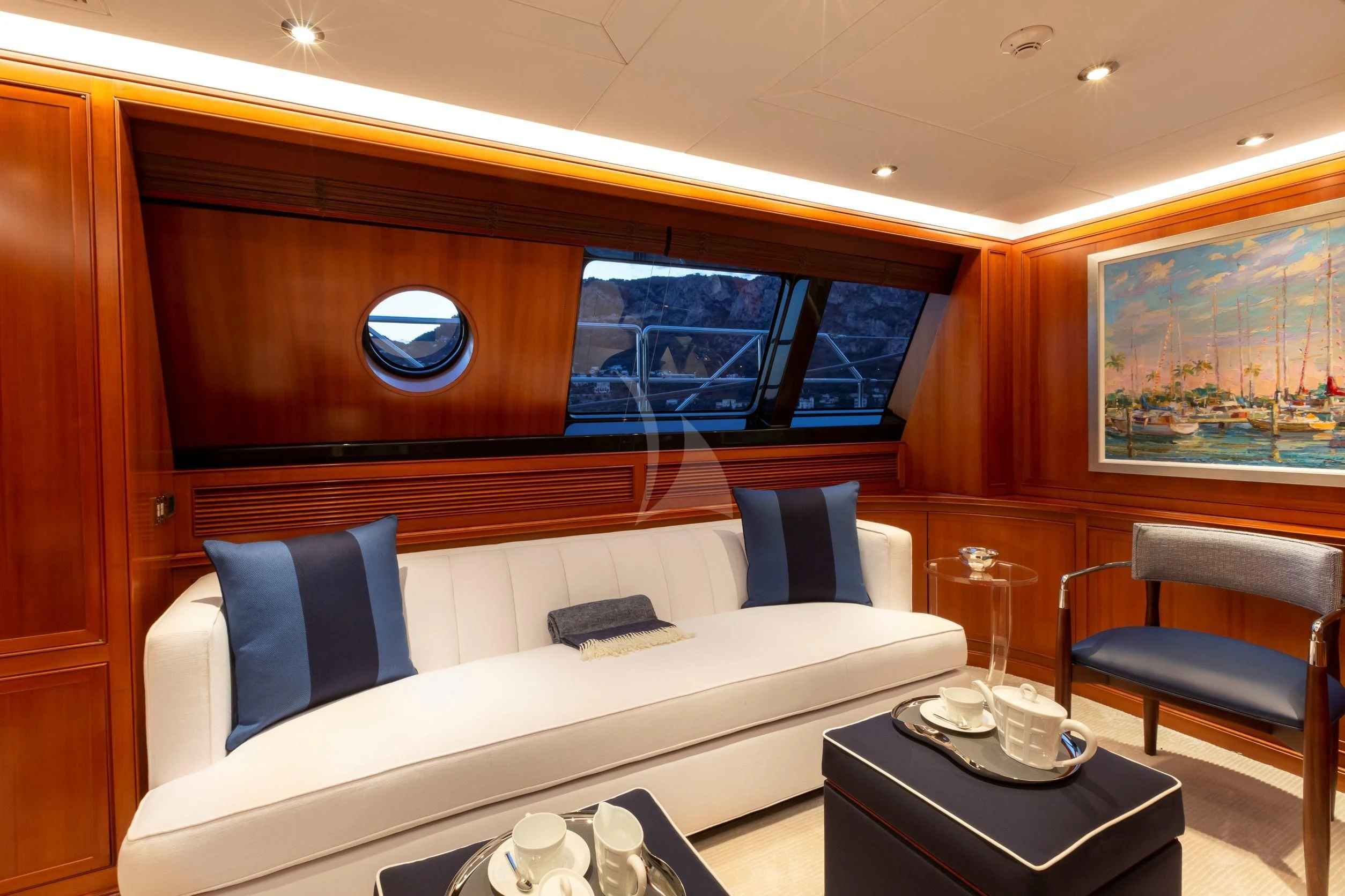 a room with a couch and a television aboard ZENJI Yacht for Sale