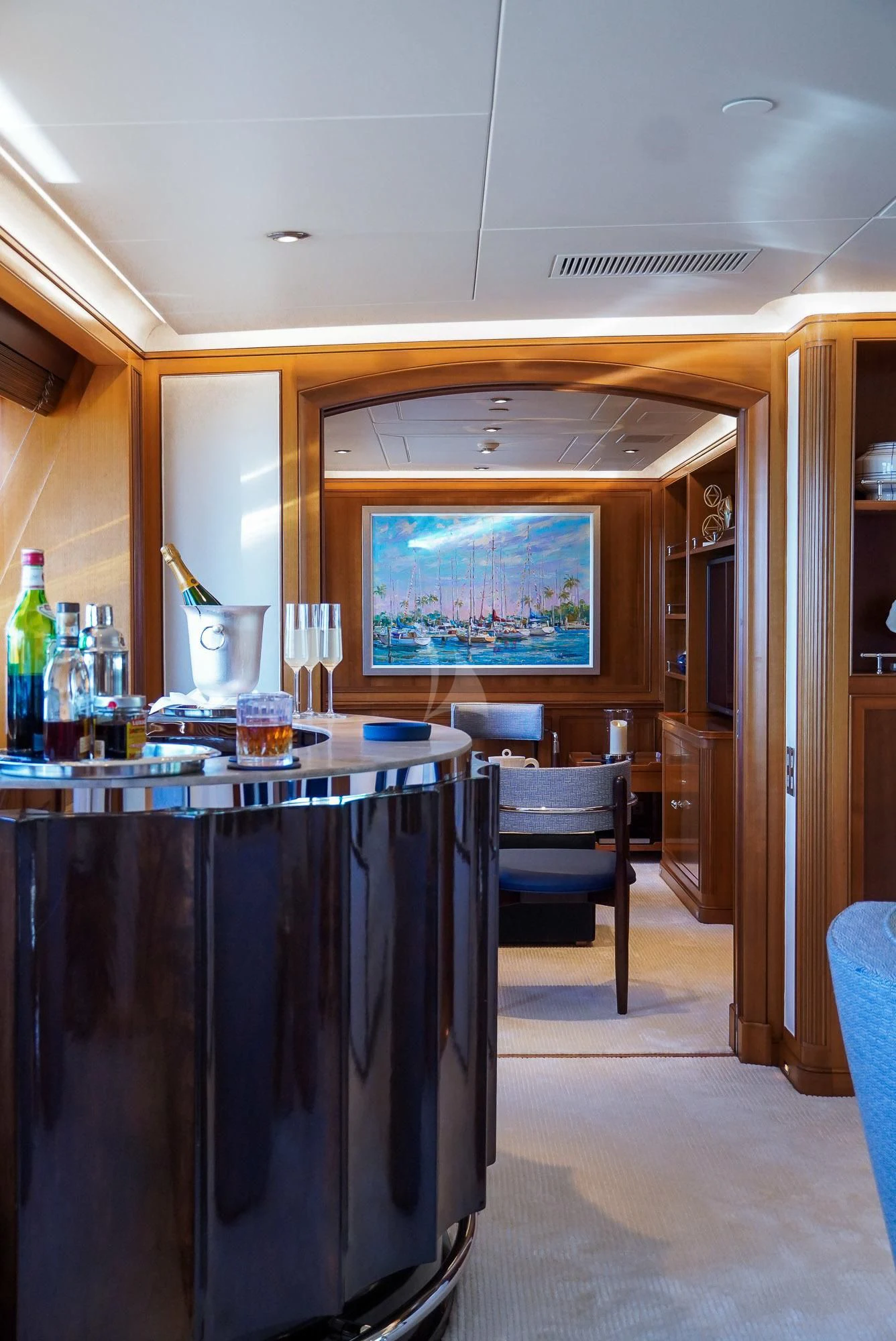 a room with a table and chairs aboard ZENJI Yacht for Sale