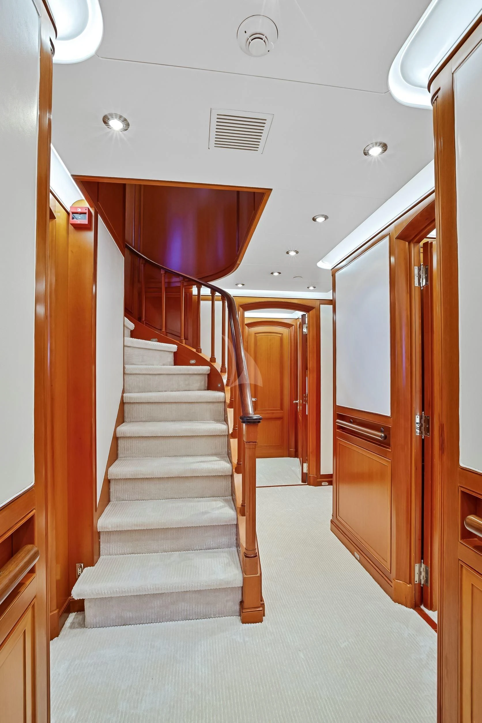 a hallway with a set of doors aboard ZENJI Yacht for Sale