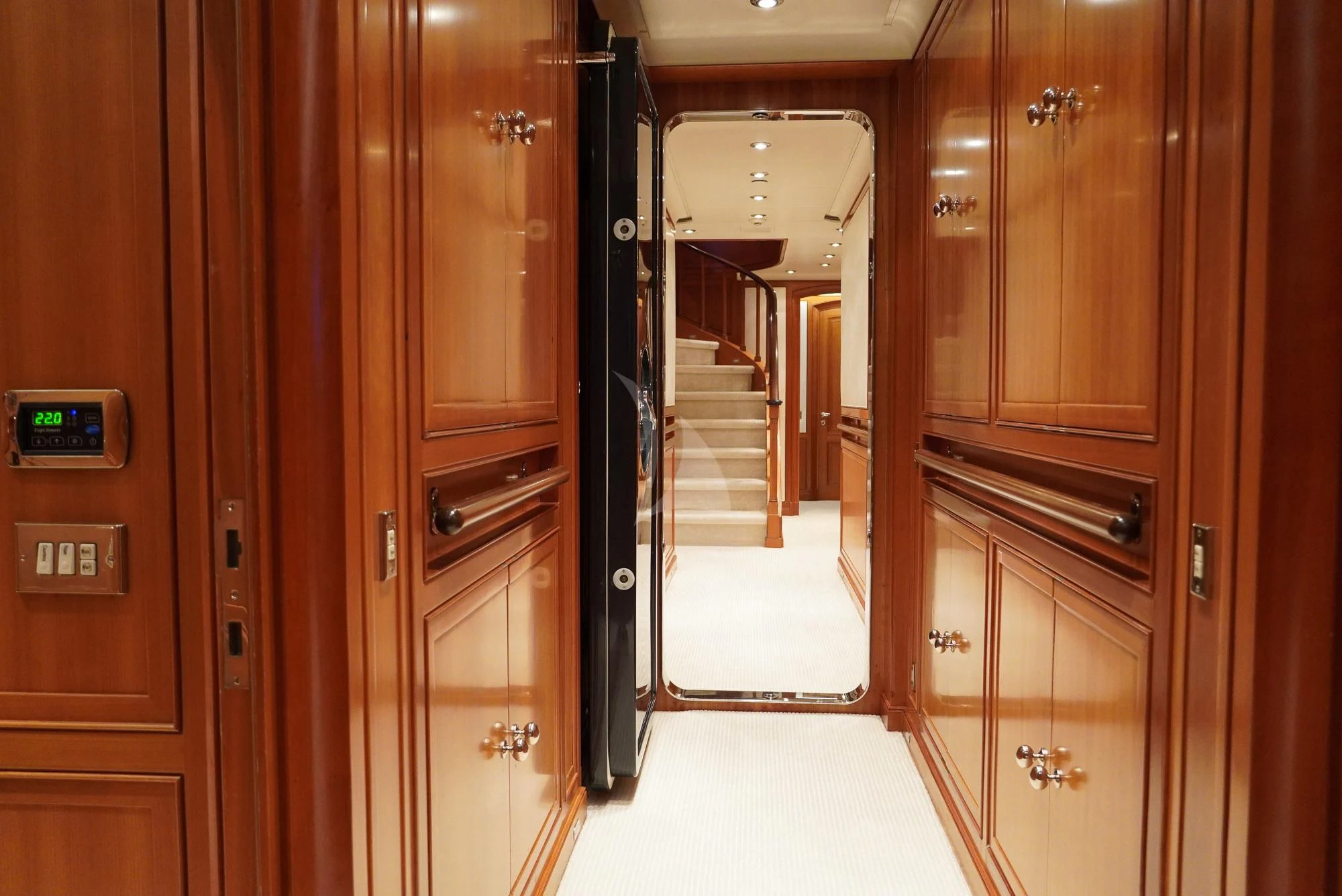 a room with a door and cabinets aboard ZENJI Yacht for Sale
