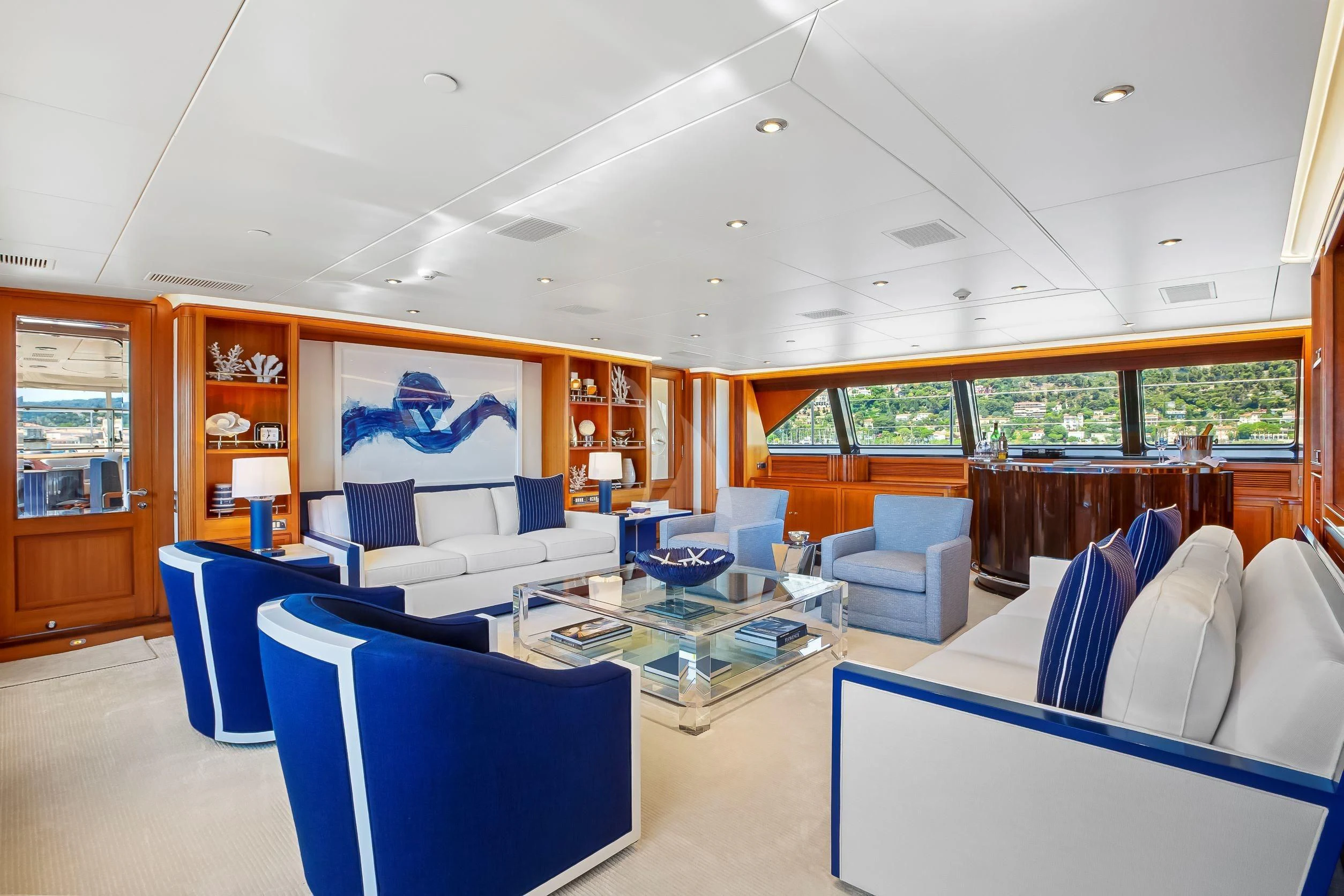 a room with a table chairs and a glass window aboard ZENJI Yacht for Sale