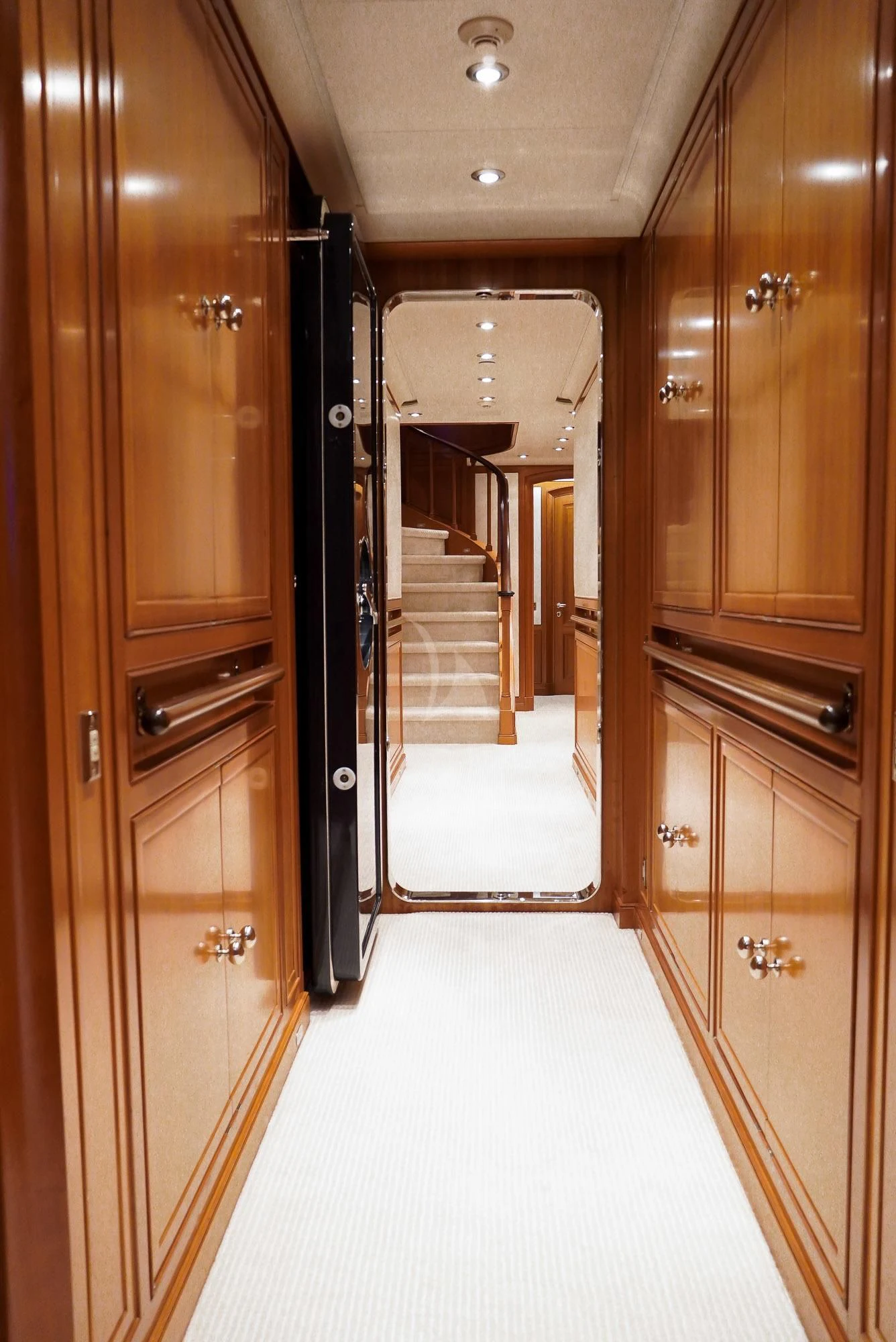 a hallway with a door and cabinets aboard ZENJI Yacht for Sale