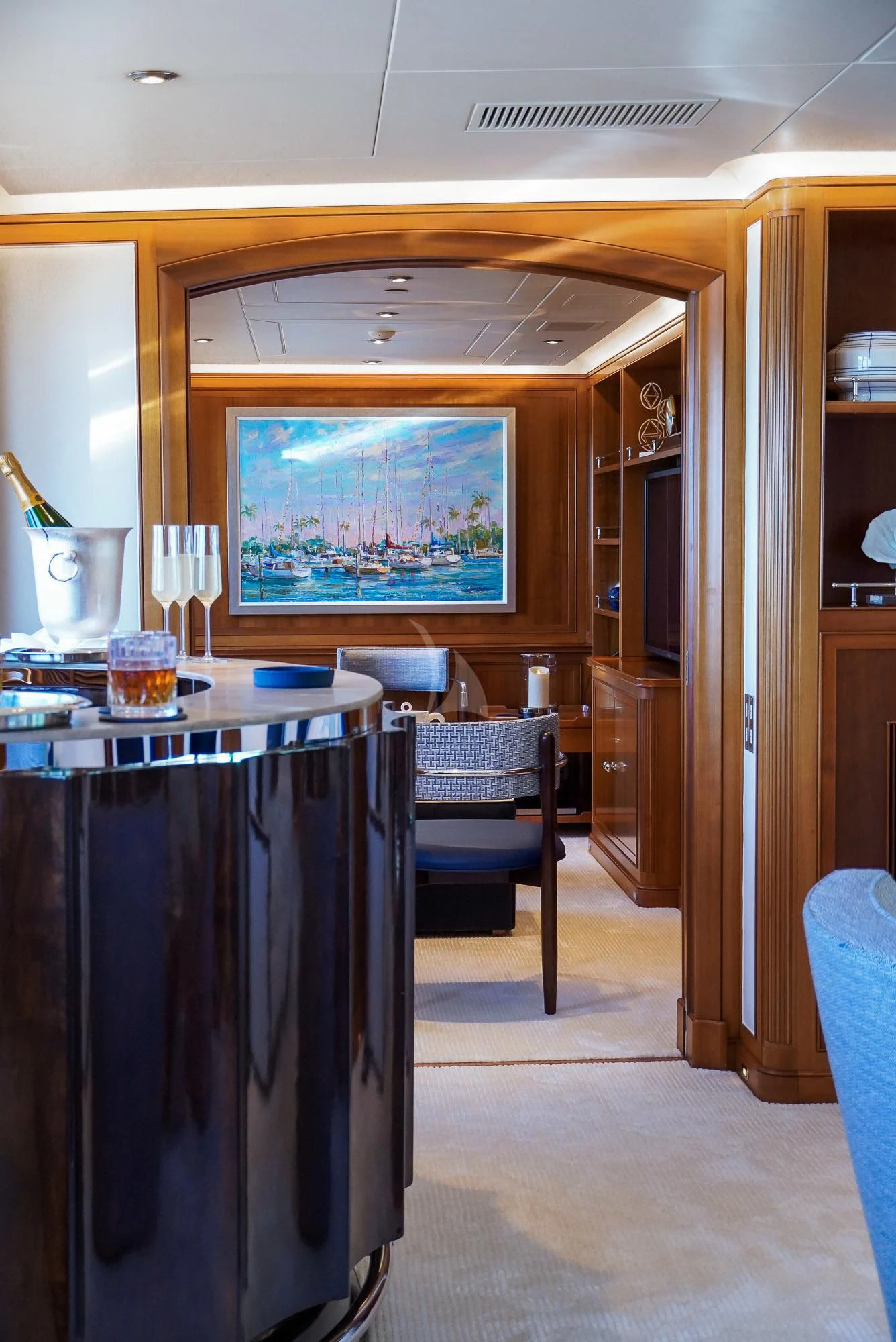 a room with a table and chairs aboard ZENJI Yacht for Sale