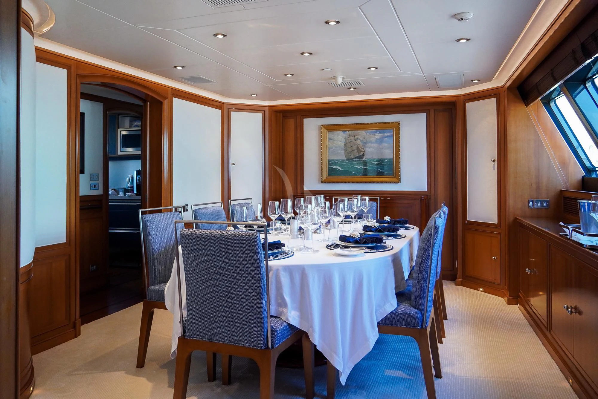 a dining room with a table aboard ZENJI Yacht for Sale