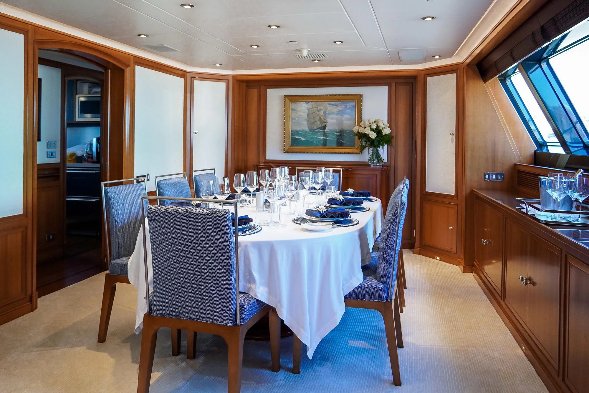 a dining room with a table aboard ZENJI Yacht for Sale