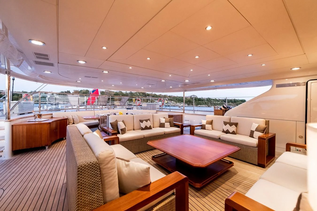 a room with a table and chairs aboard ZENJI Yacht for Sale