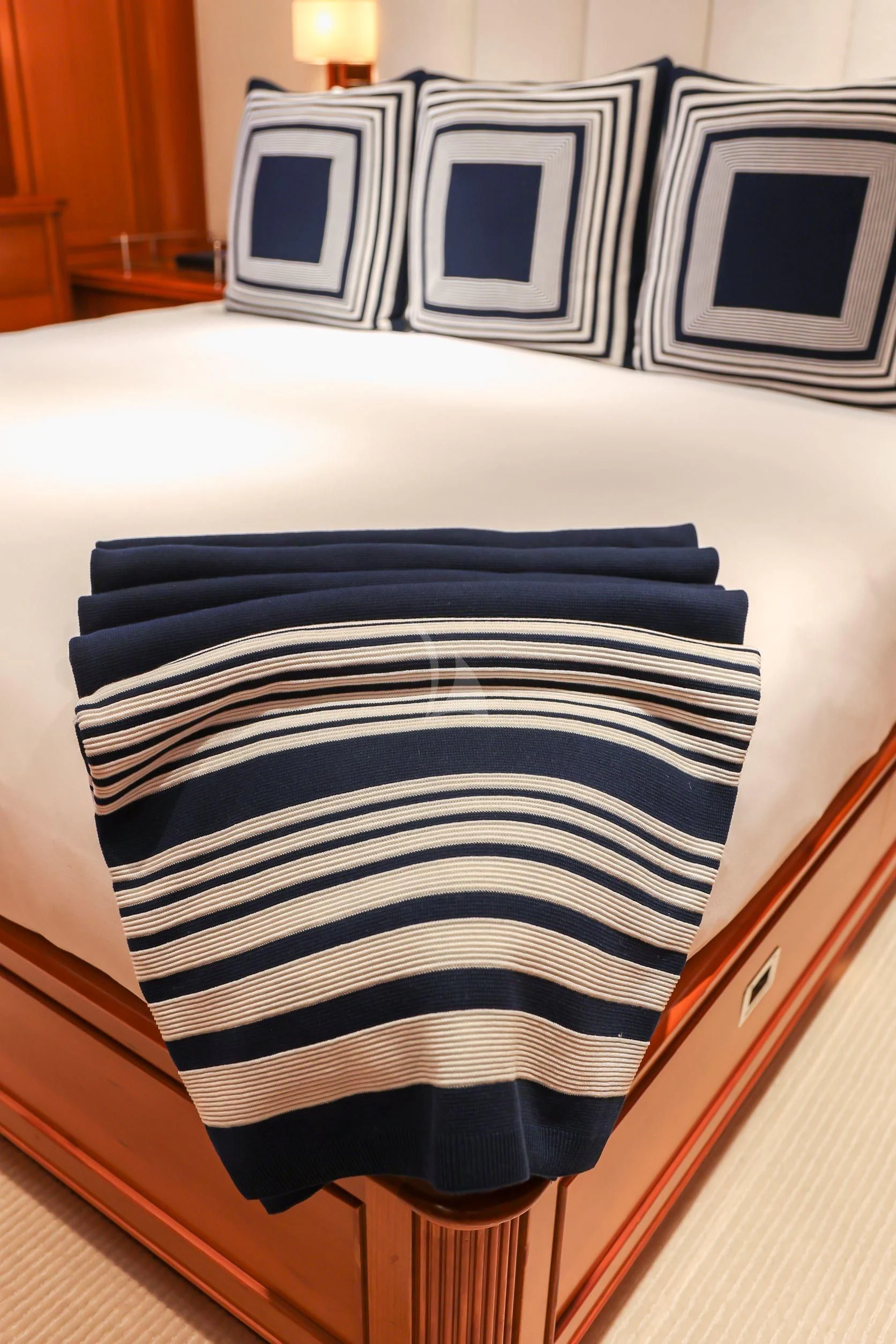 a folded towel on a table aboard ZENJI Yacht for Sale