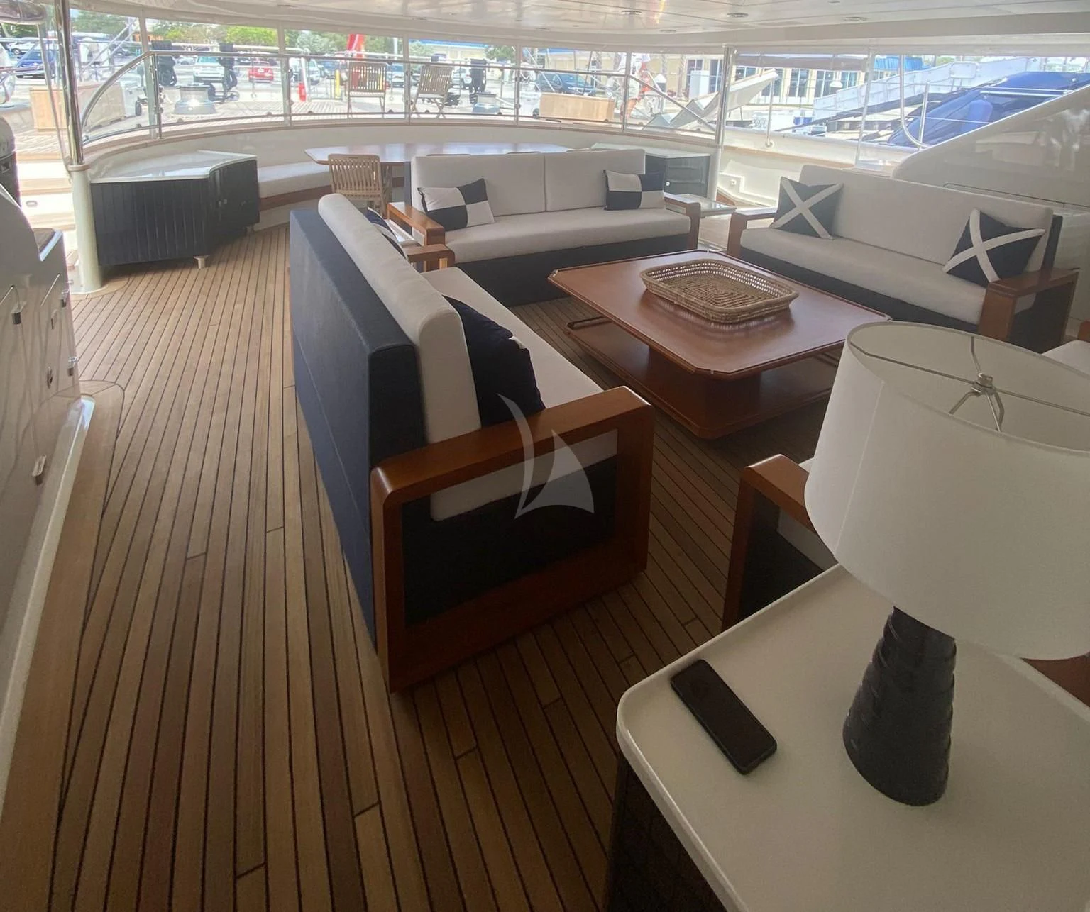 a room with a table and chairs aboard ZENJI Yacht for Sale