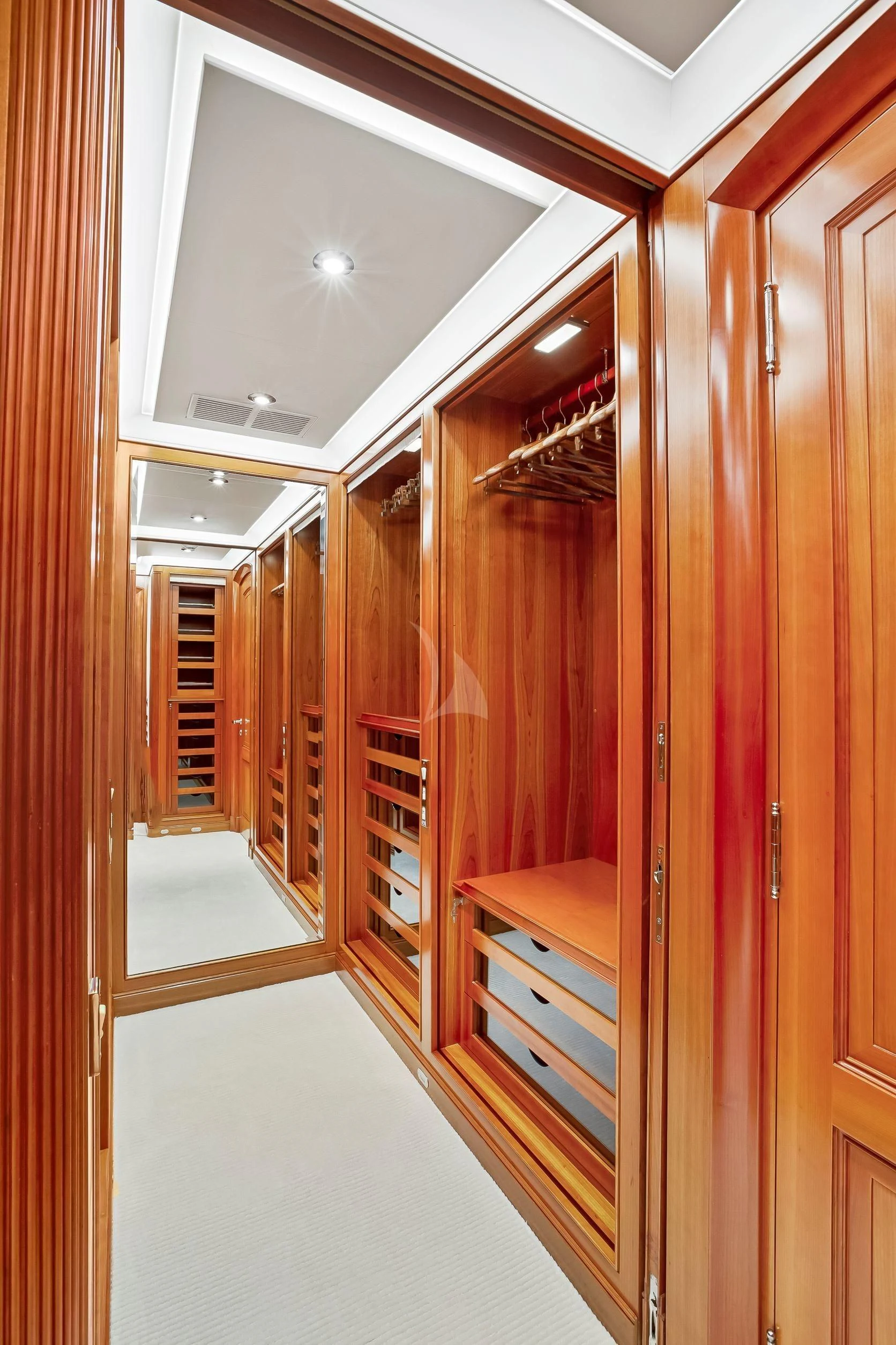 a room with wooden doors aboard ZENJI Yacht for Sale