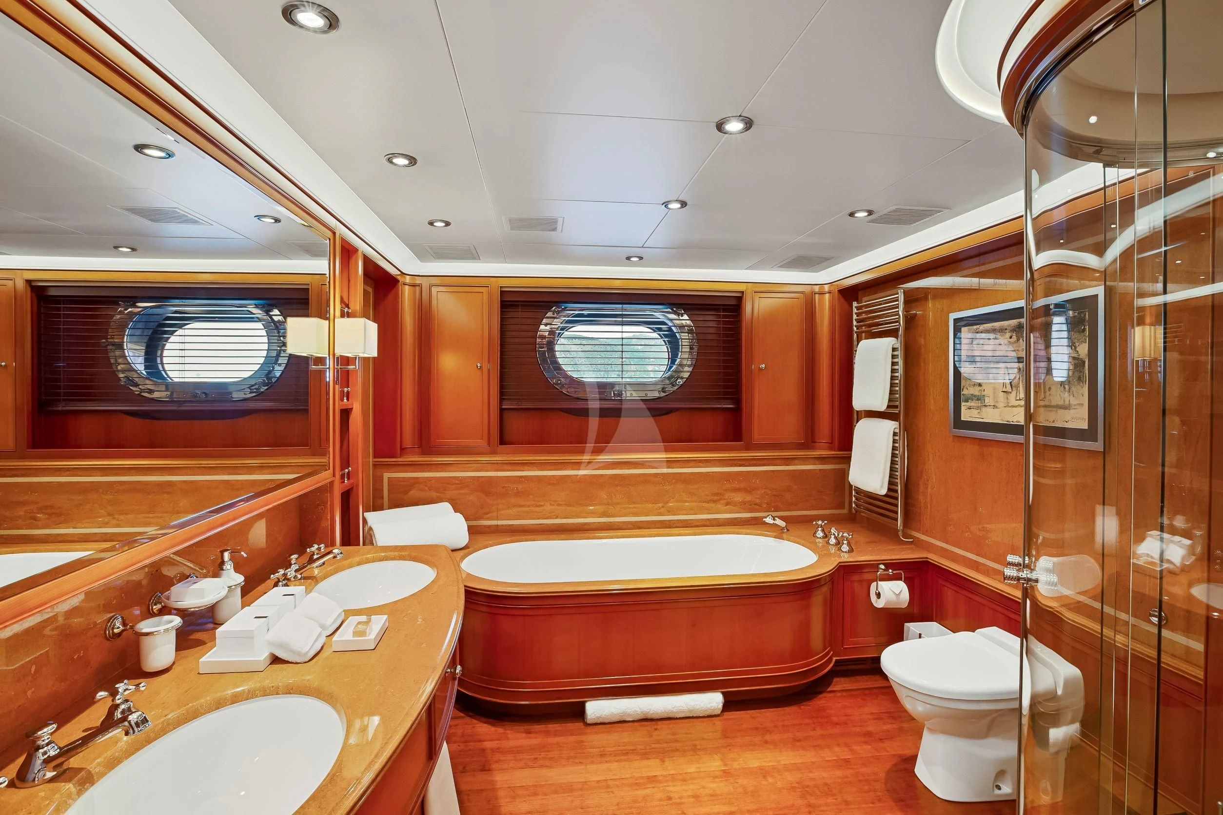 a bathroom with a tub sink and toilet aboard ZENJI Yacht for Sale