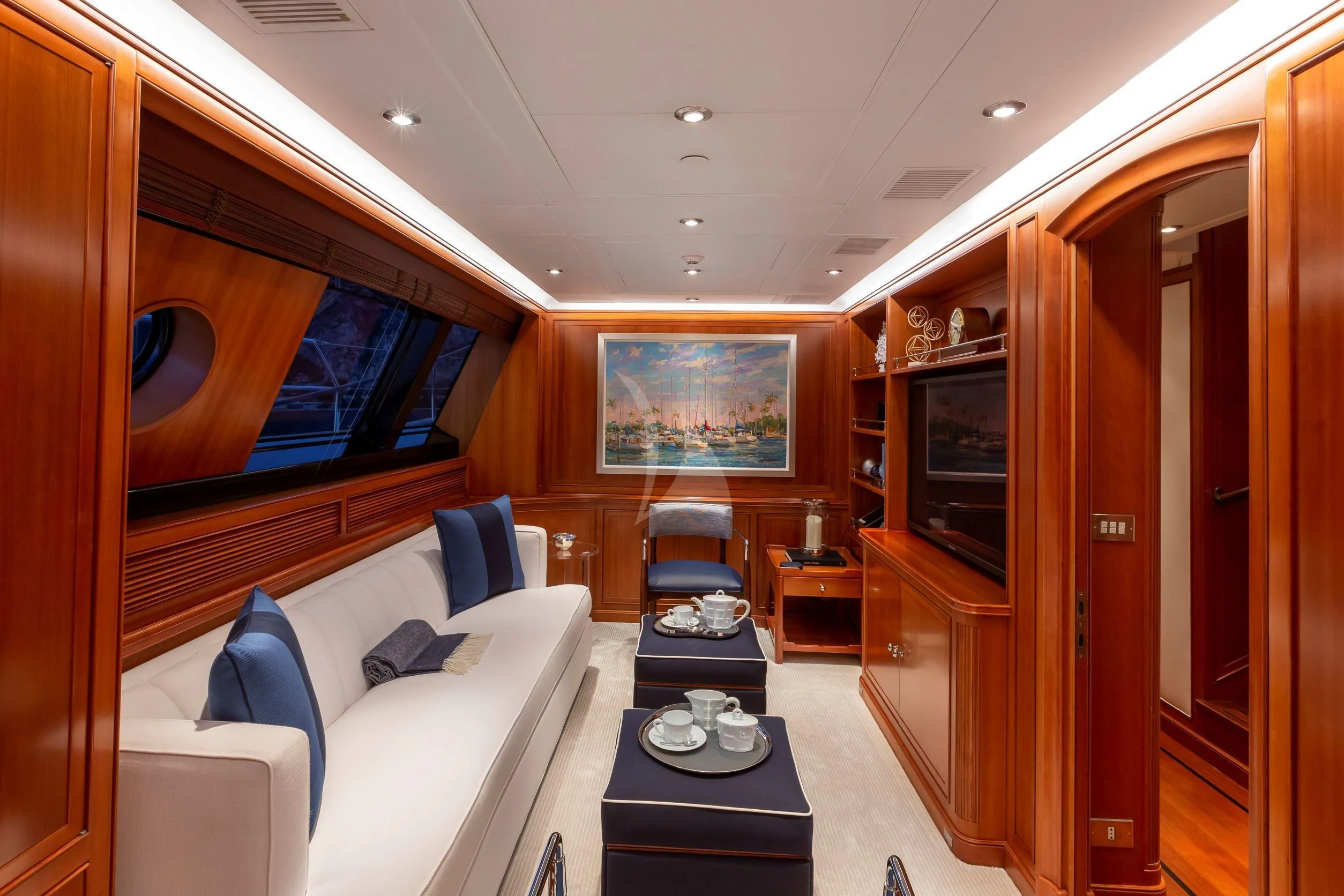 a room with a couch and a television aboard ZENJI Yacht for Sale