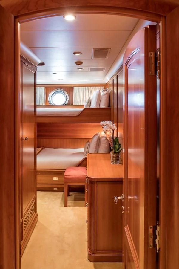a room with a wood cabinet and a mirror aboard ZENJI Yacht for Sale