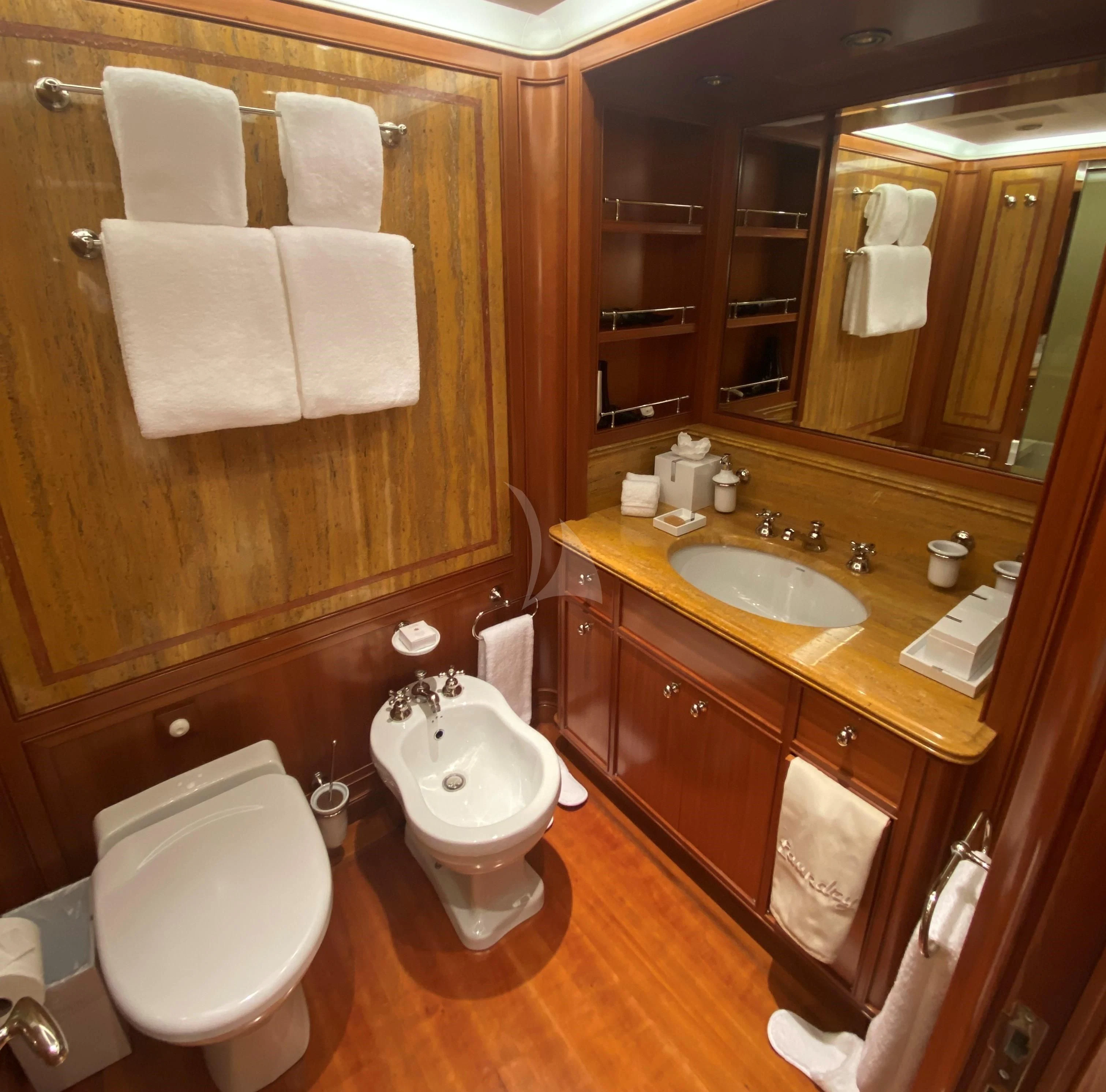 a bathroom with a toilet and sink aboard ZENJI Yacht for Sale