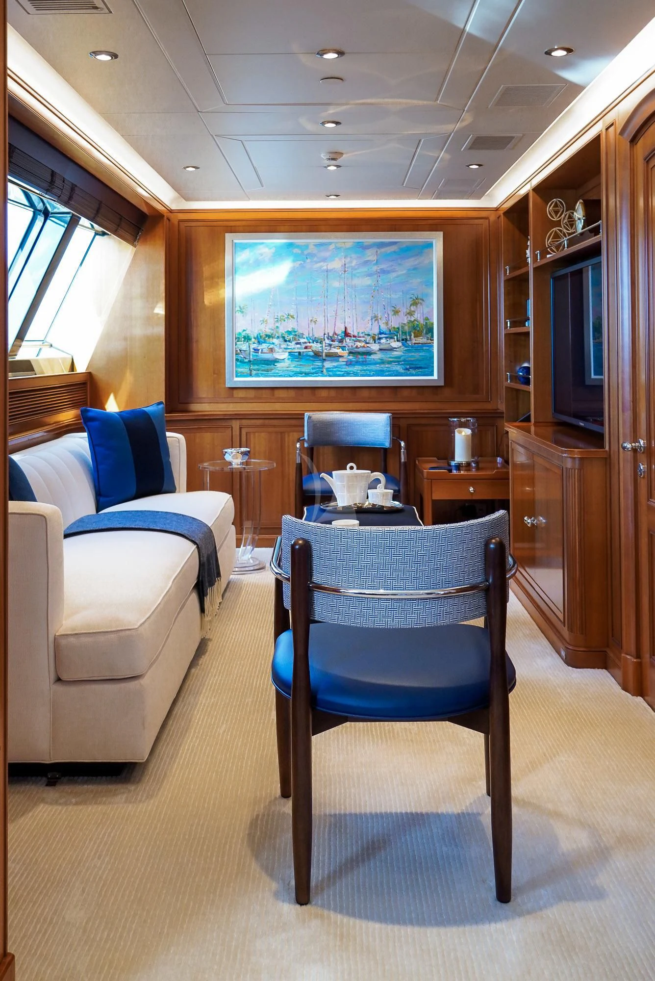 a room with chairs and a table aboard ZENJI Yacht for Sale