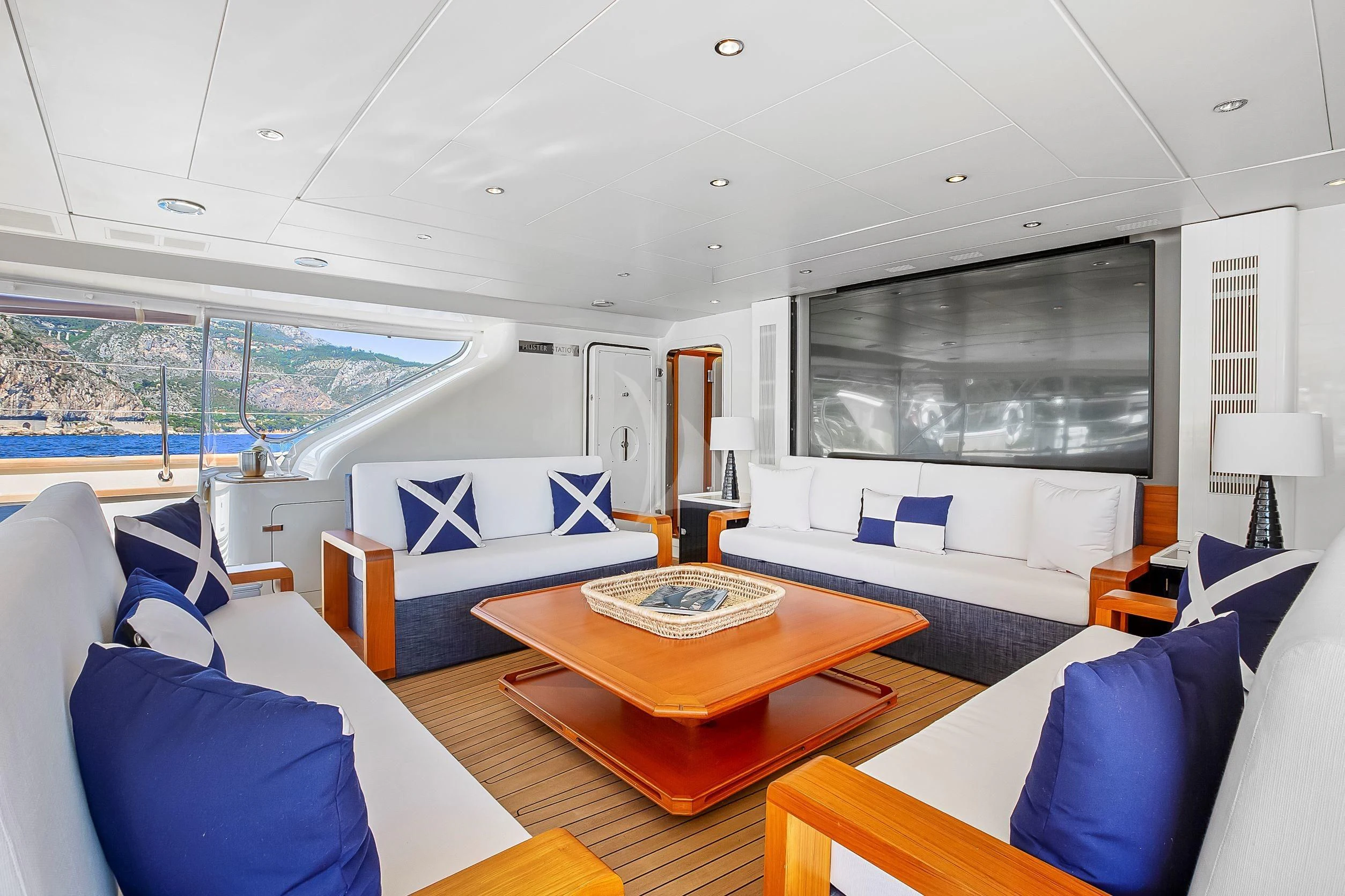 a living room with a large window aboard ZENJI Yacht for Sale