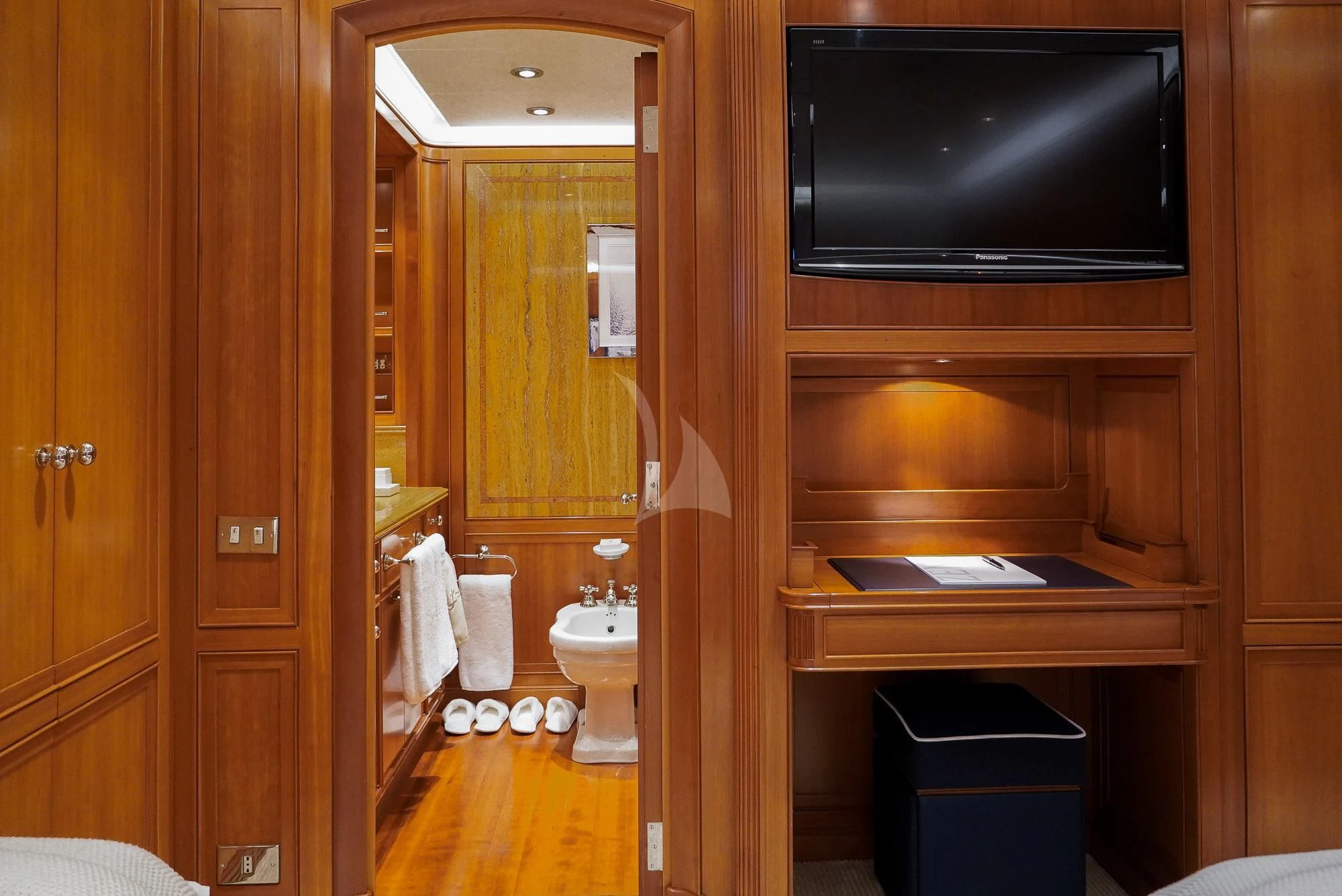 a bathroom with a wood cabinet aboard ZENJI Yacht for Sale