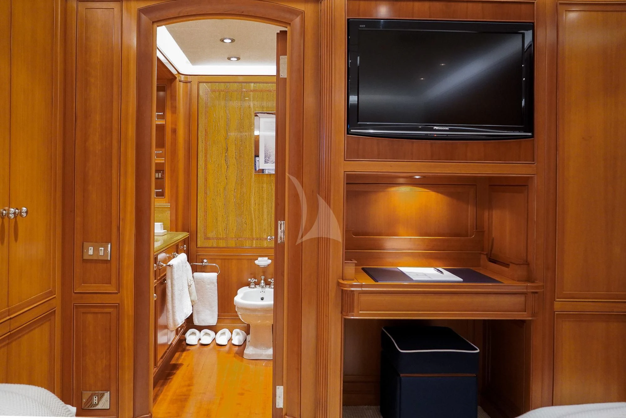 a bathroom with a wood cabinet aboard ZENJI Yacht for Sale