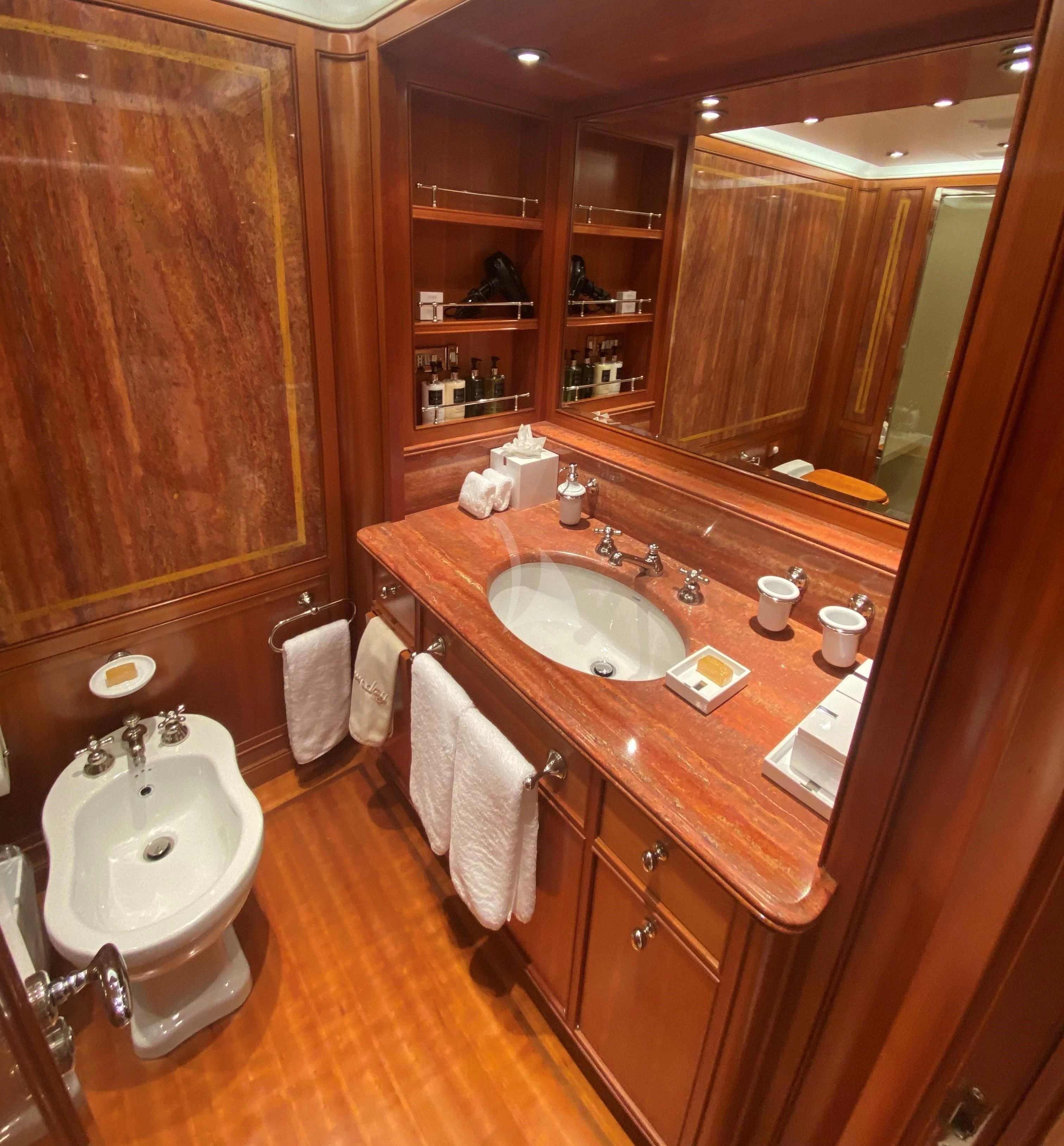 a bathroom with a sink and a mirror aboard ZENJI Yacht for Sale