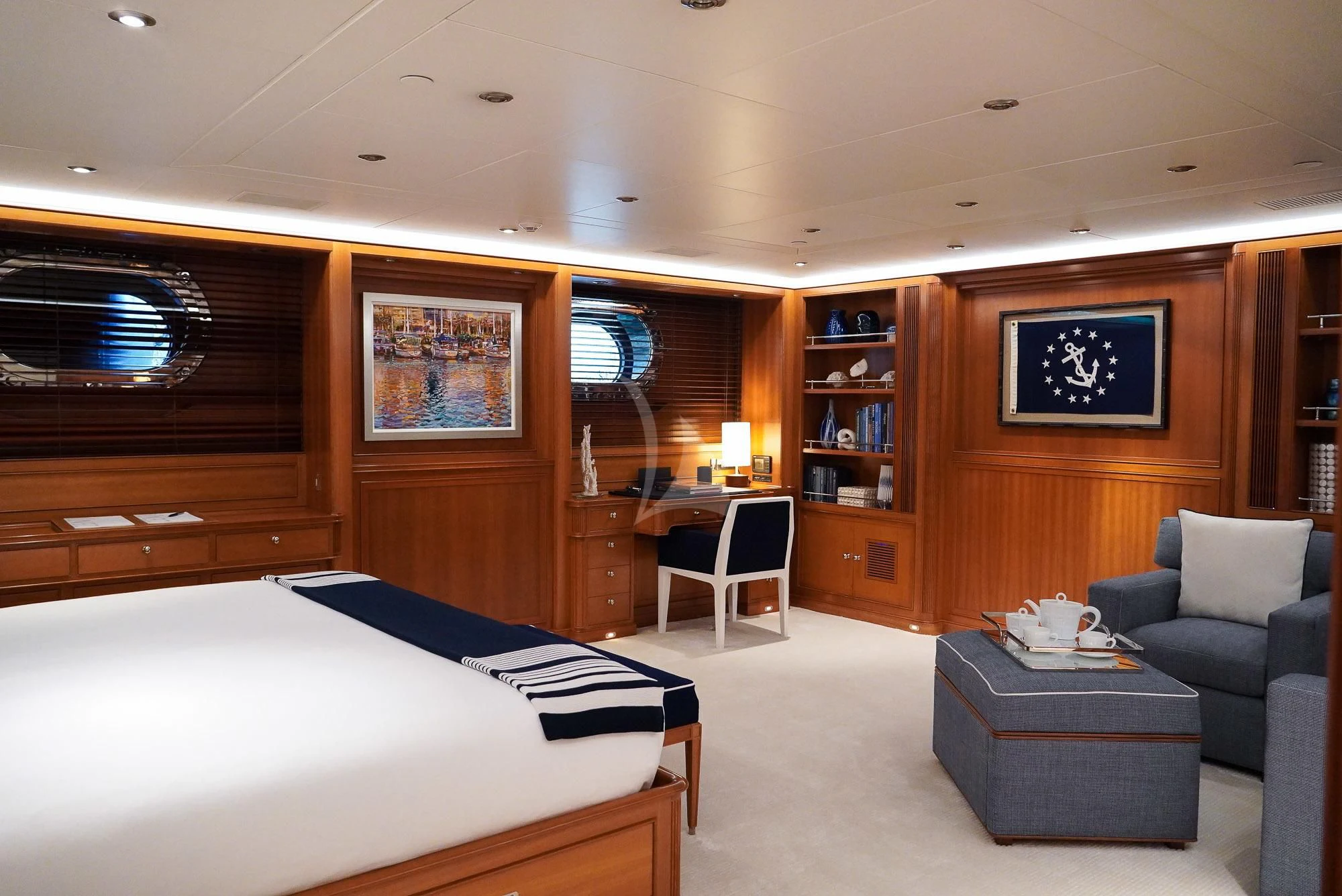 a room with a bed and a chair aboard ZENJI Yacht for Sale