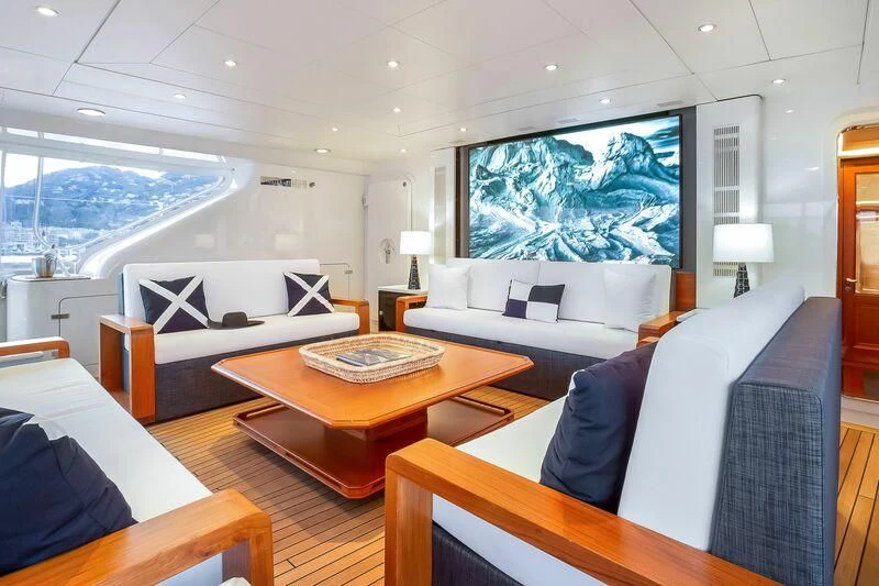 a living room with a large painting aboard ZENJI Yacht for Sale
