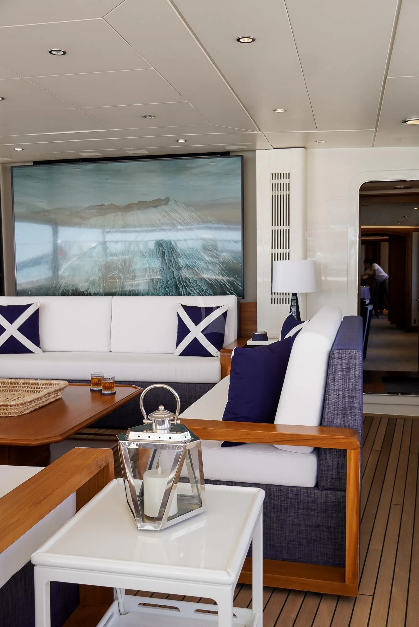 a living room with a large screen aboard ZENJI Yacht for Sale